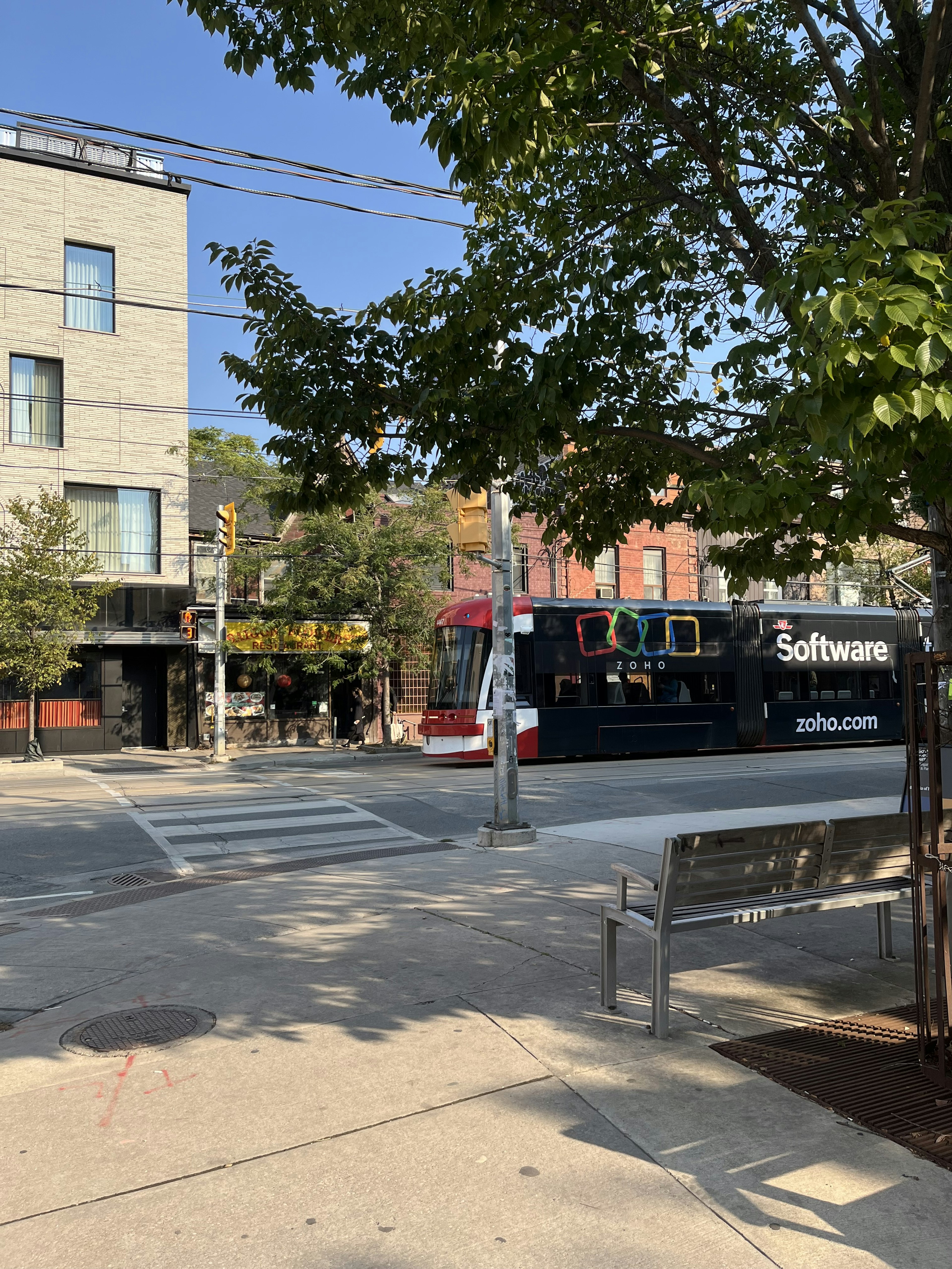 Urban scene featuring a software truck and buildings