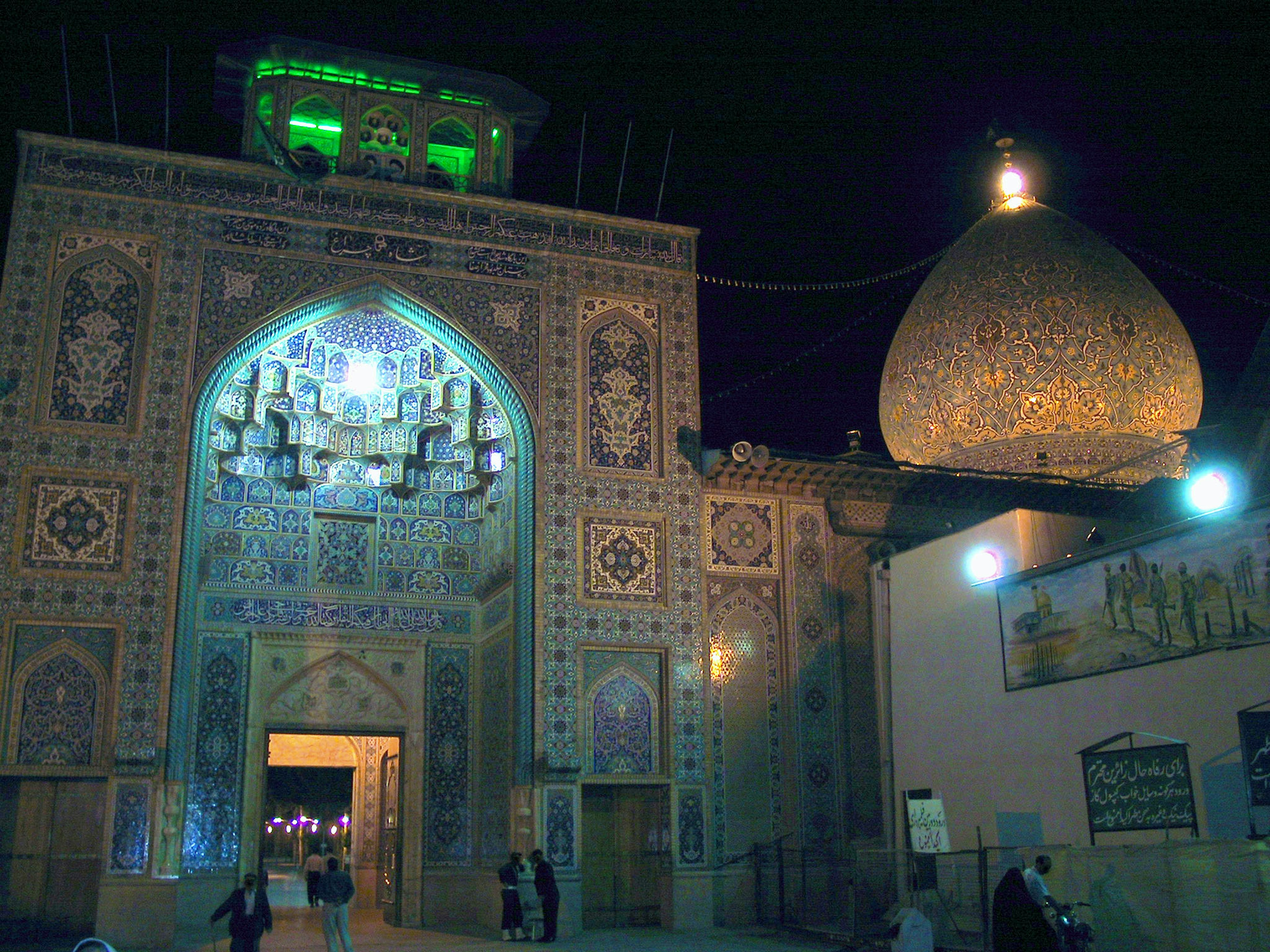 Beautifully decorated entrance with a dome at night