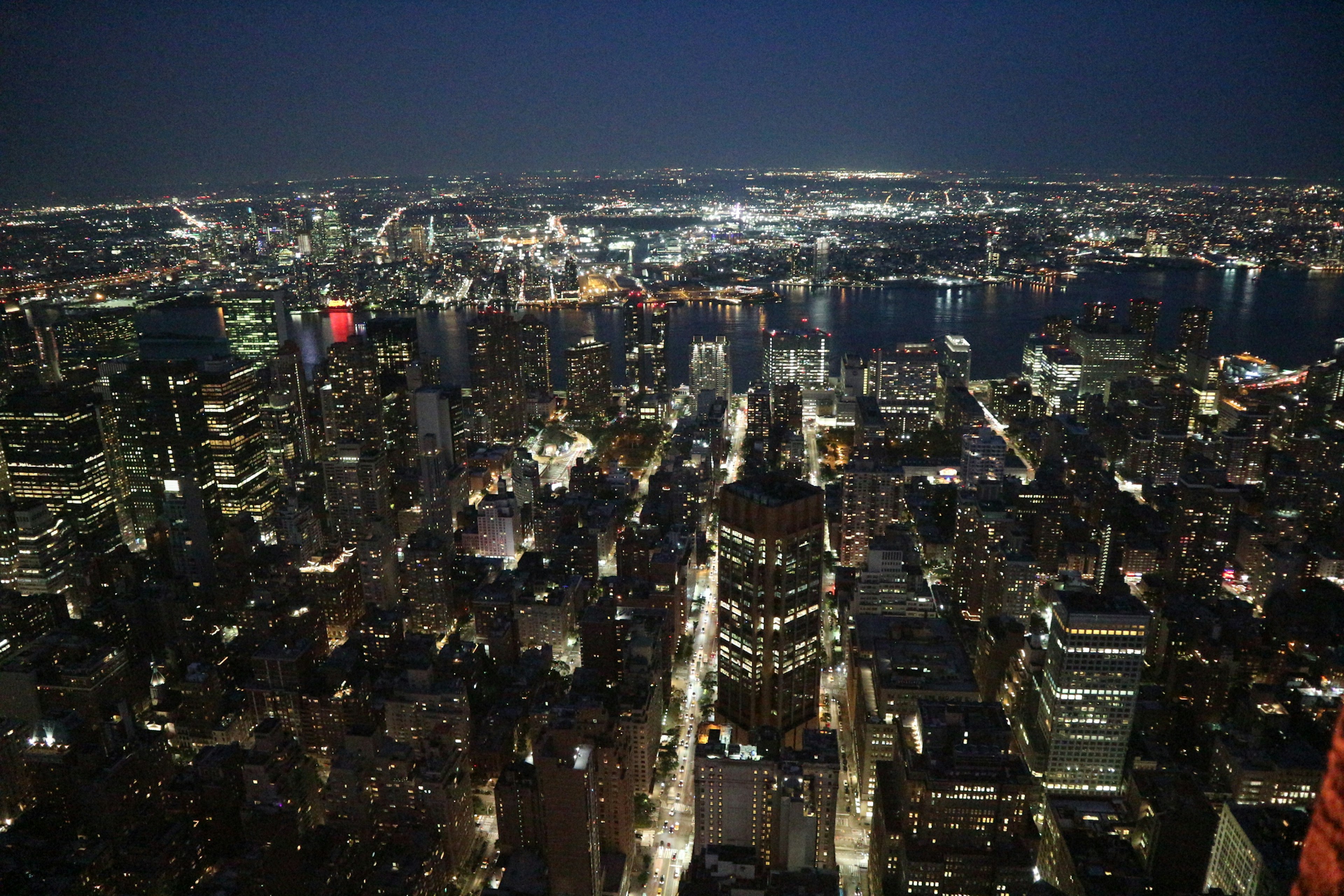 Aerial view of New York City skyline at night