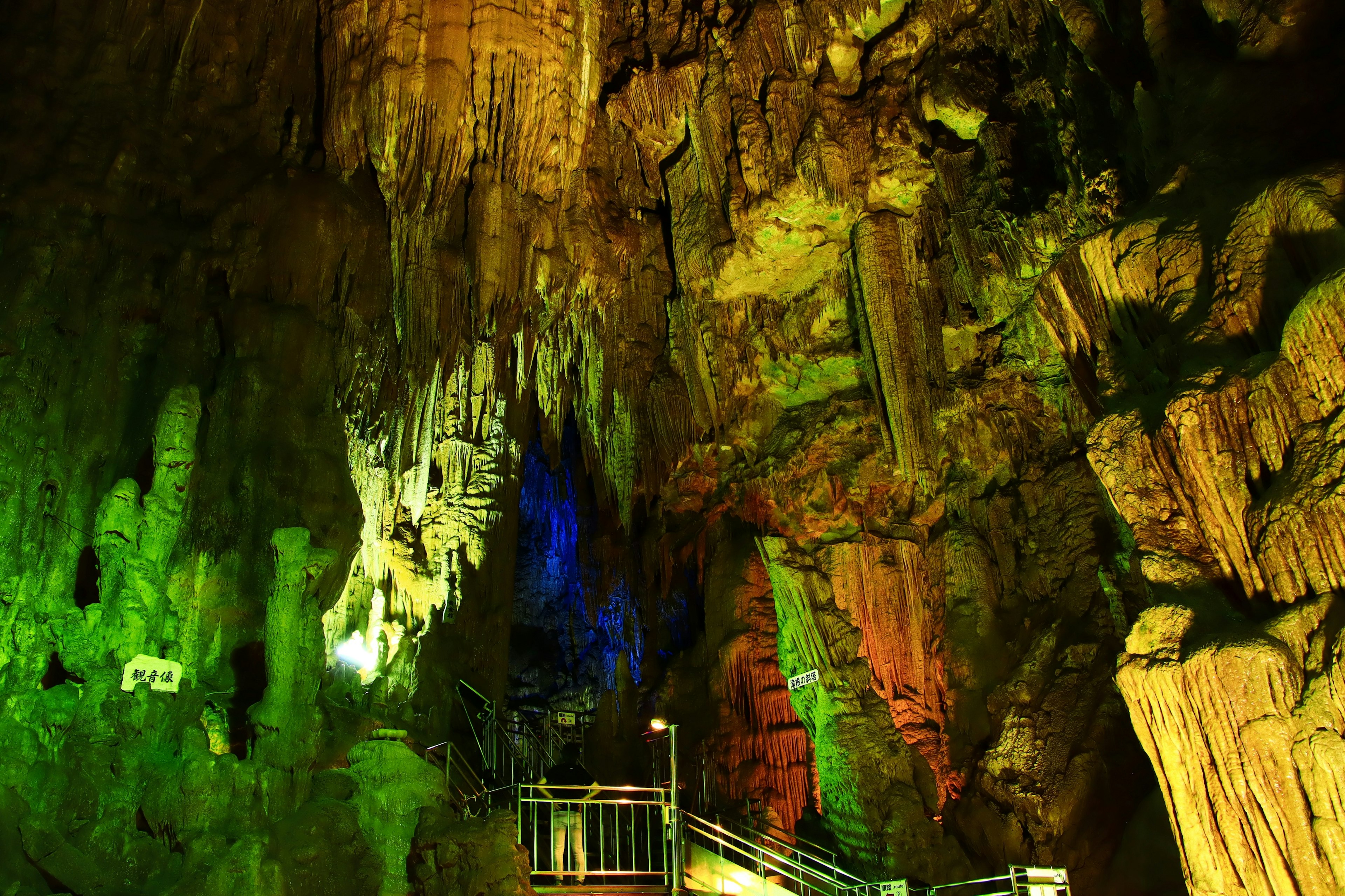 Colorful cave interior with visible stalactites