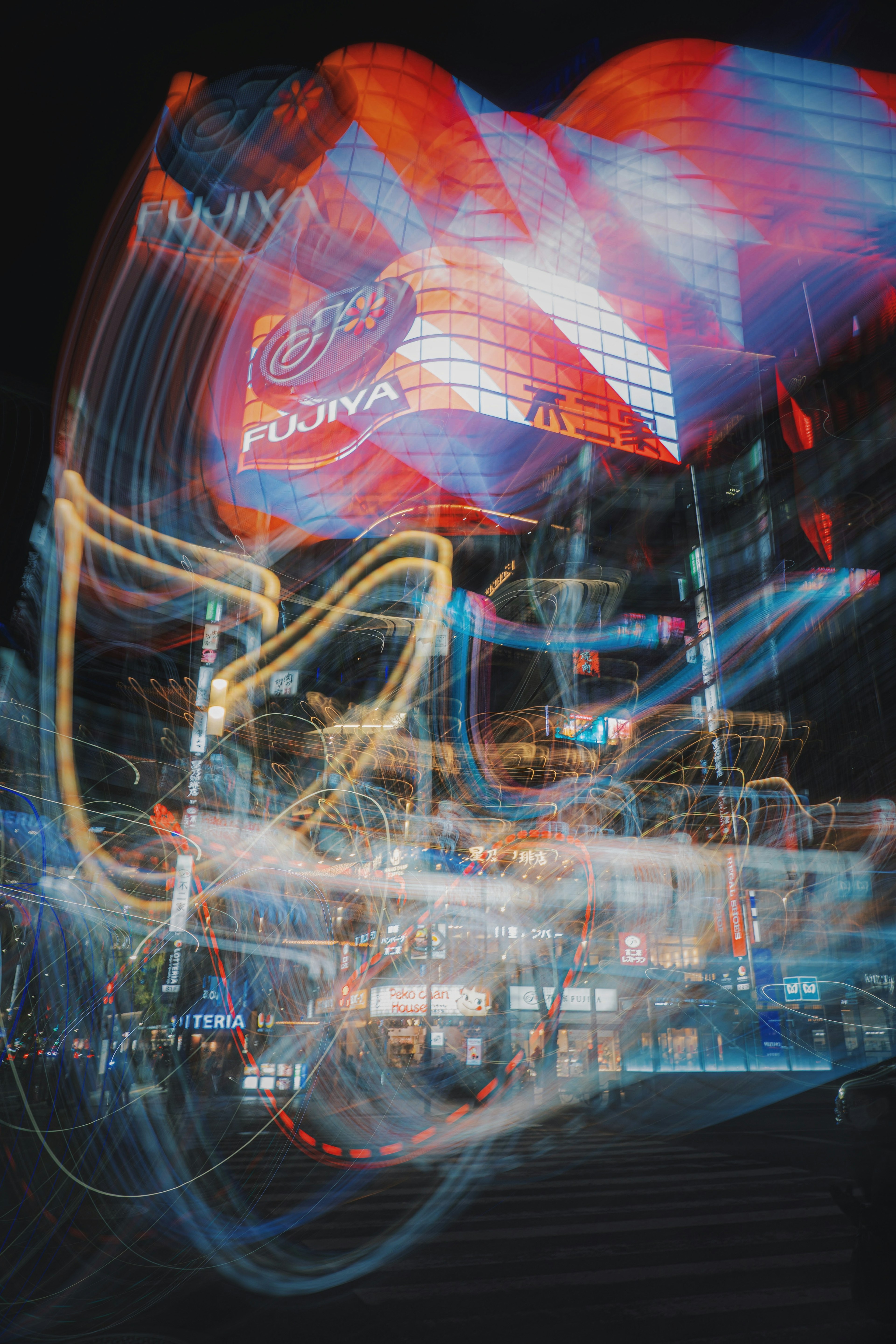 Vibrant neon lights and flowing light trails in a nighttime urban setting