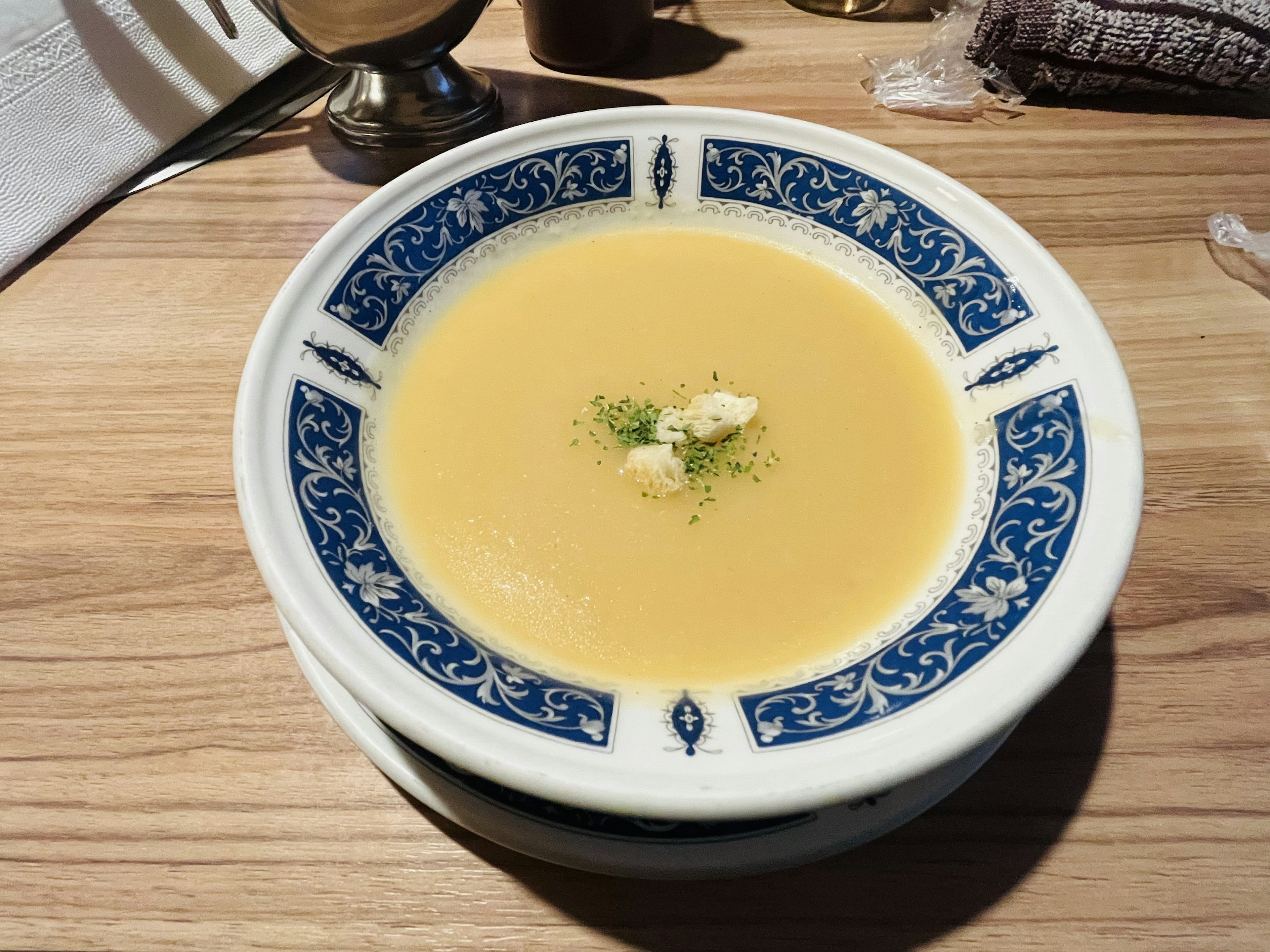 Cream soup in a blue patterned bowl