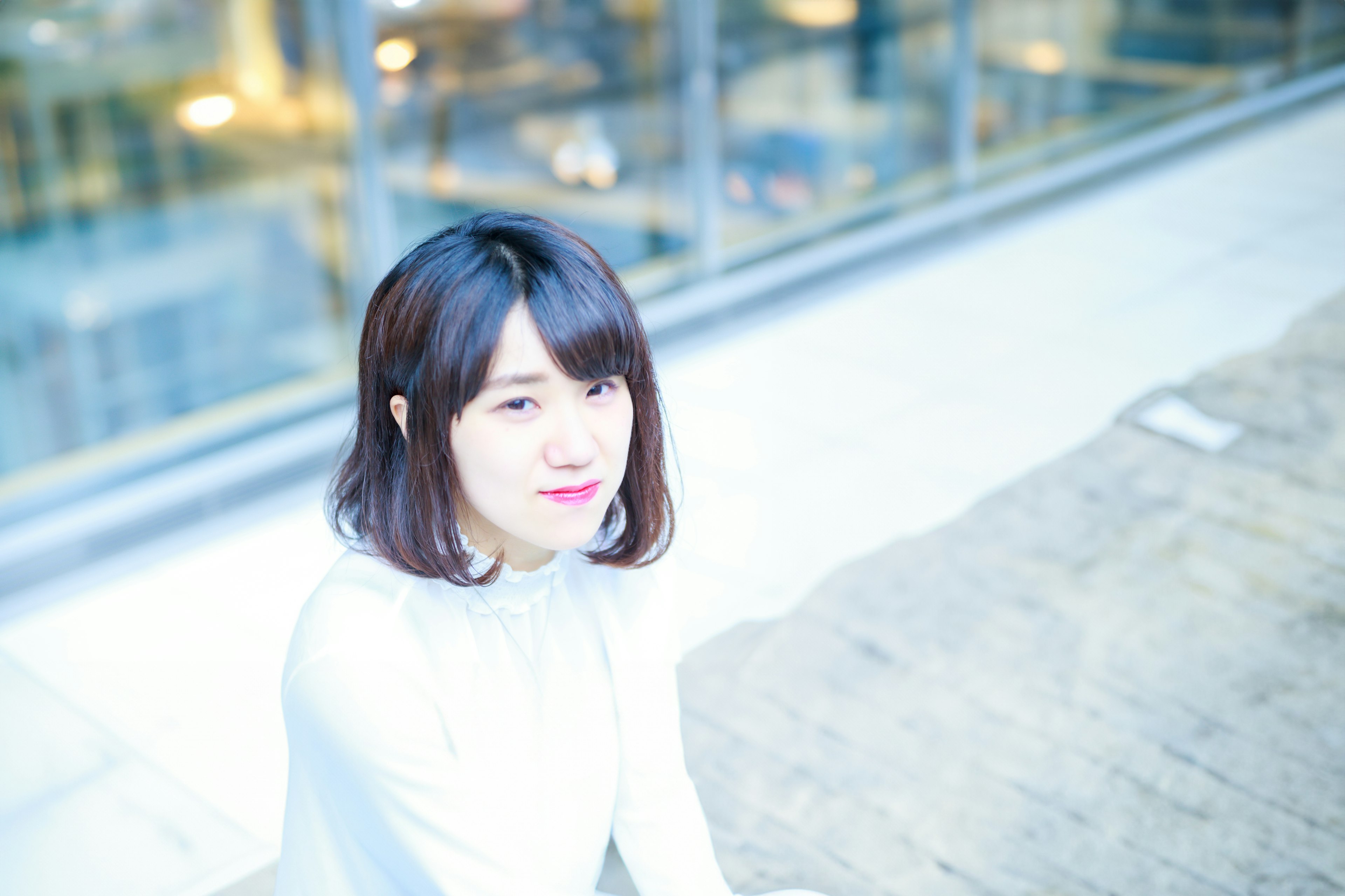 Portrait of a woman smiling in soft lighting