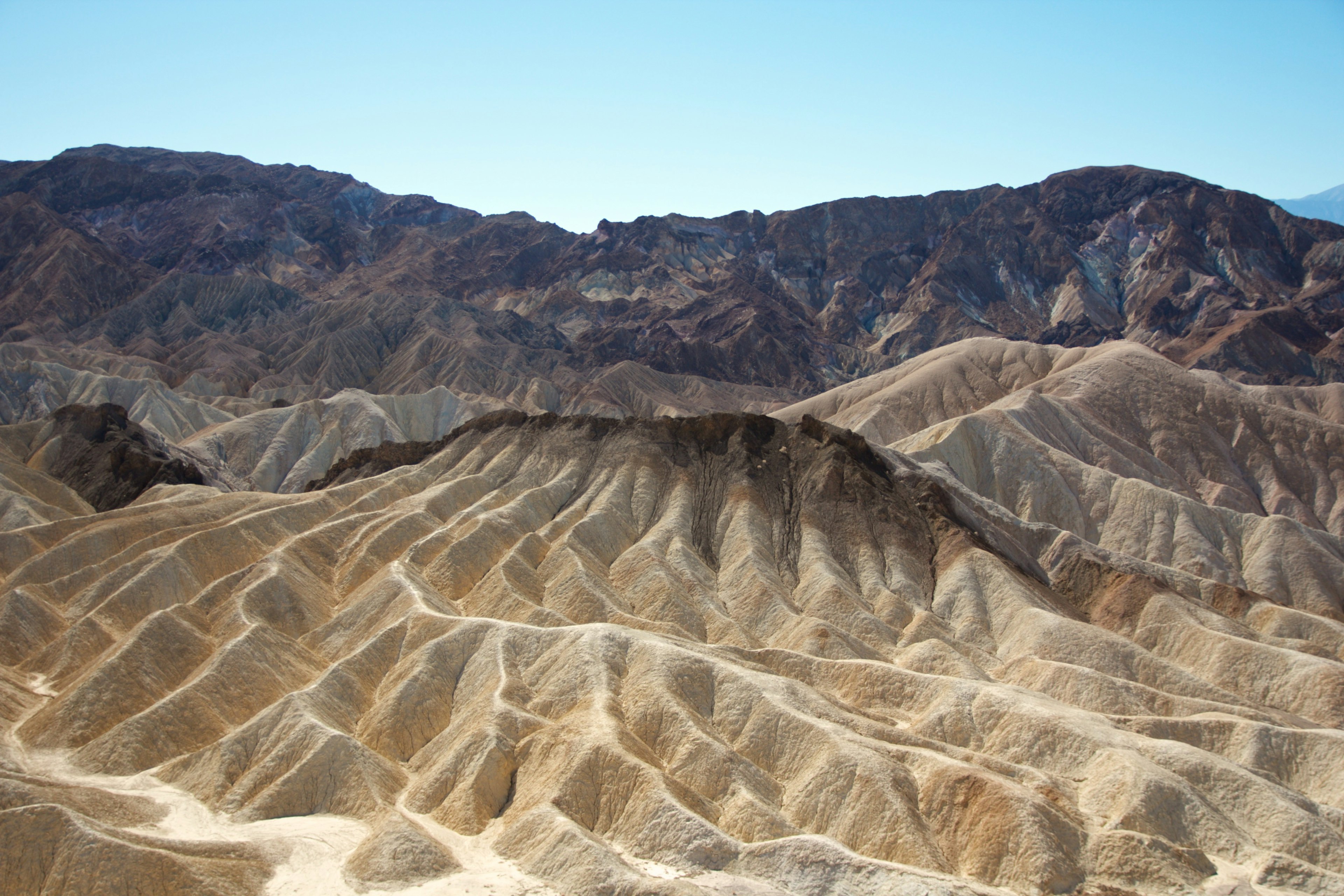 Dry mountains with intricate terrain and color variations