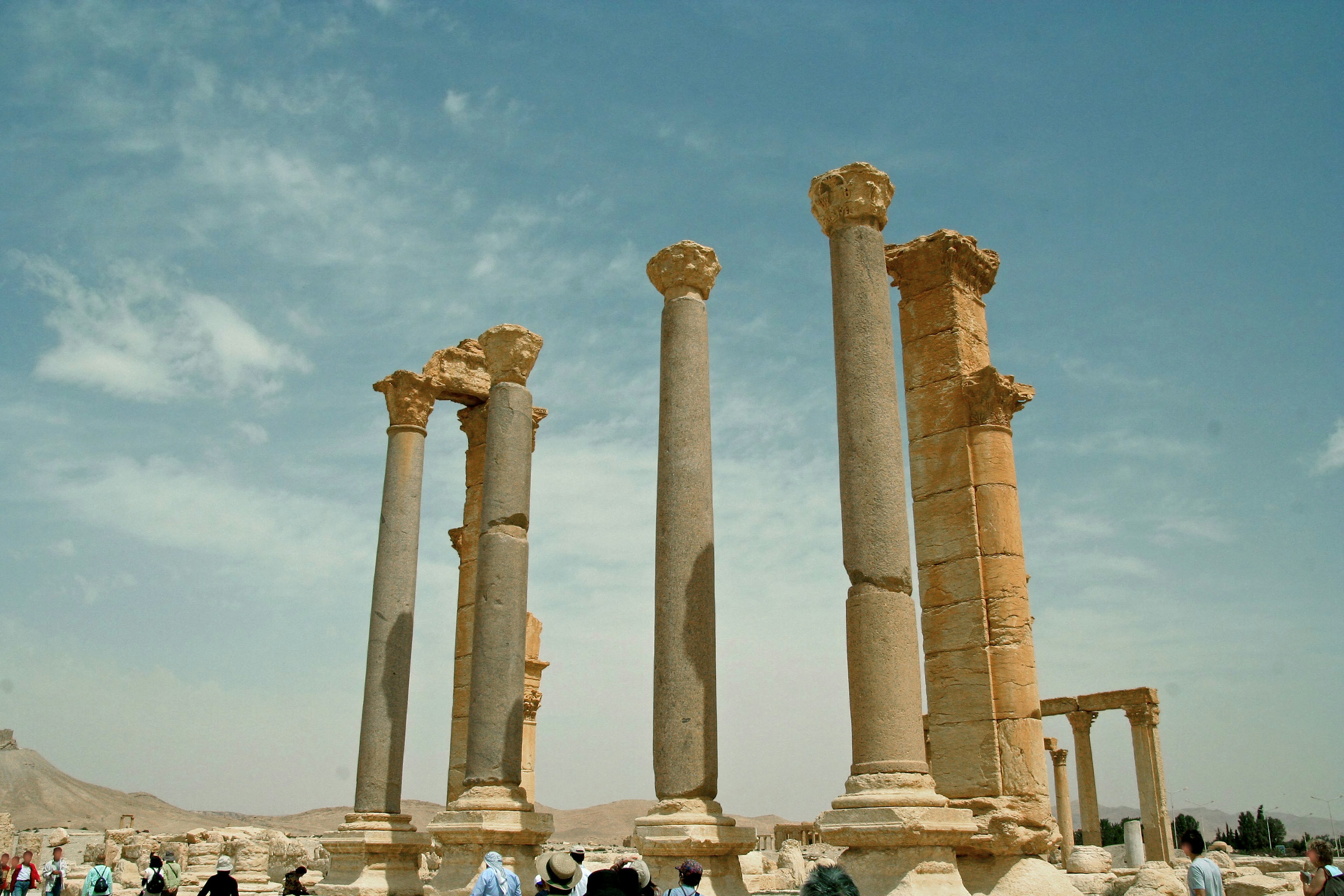 Ancient columns standing under a blue sky