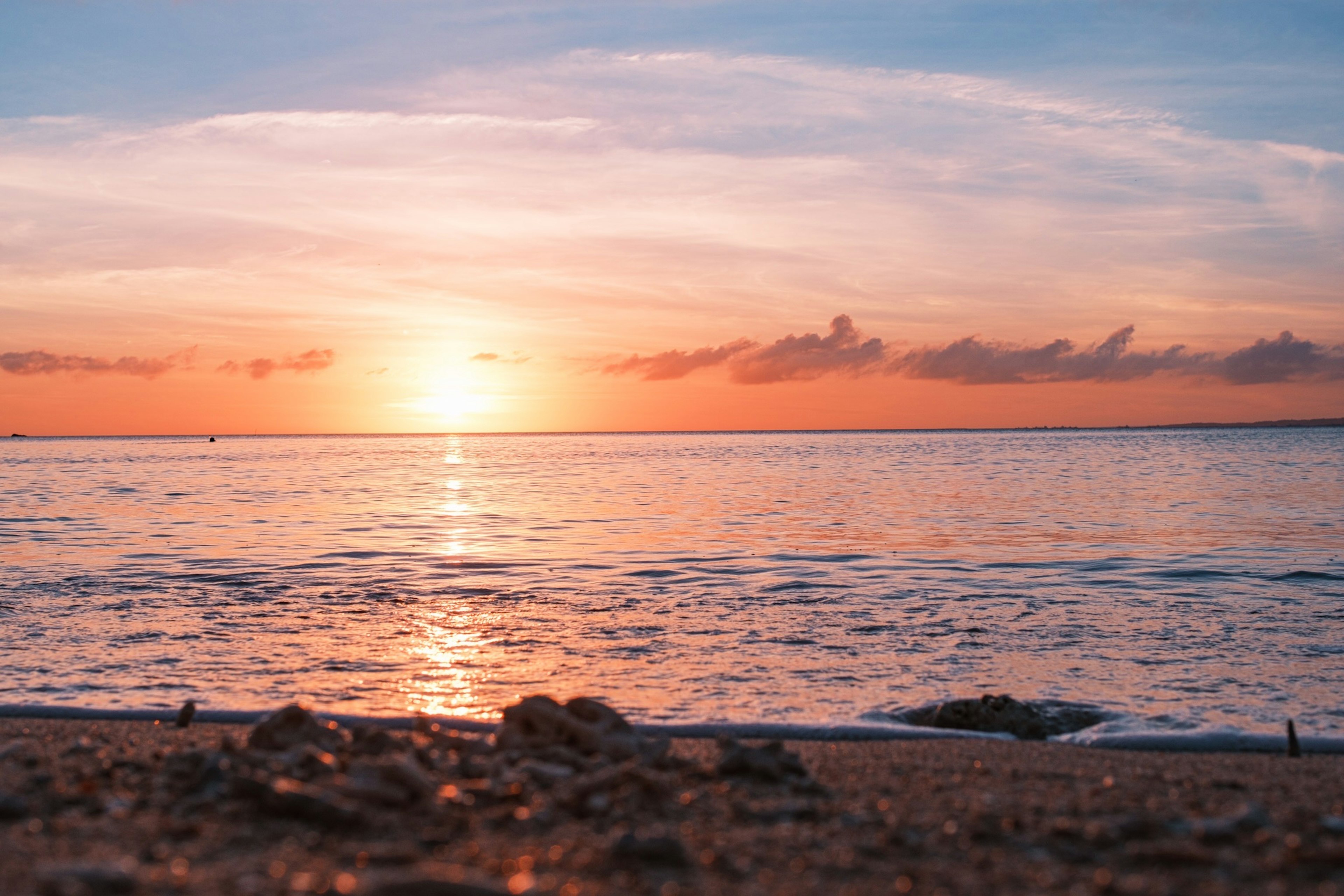 Beautiful sunset over the ocean with gentle waves