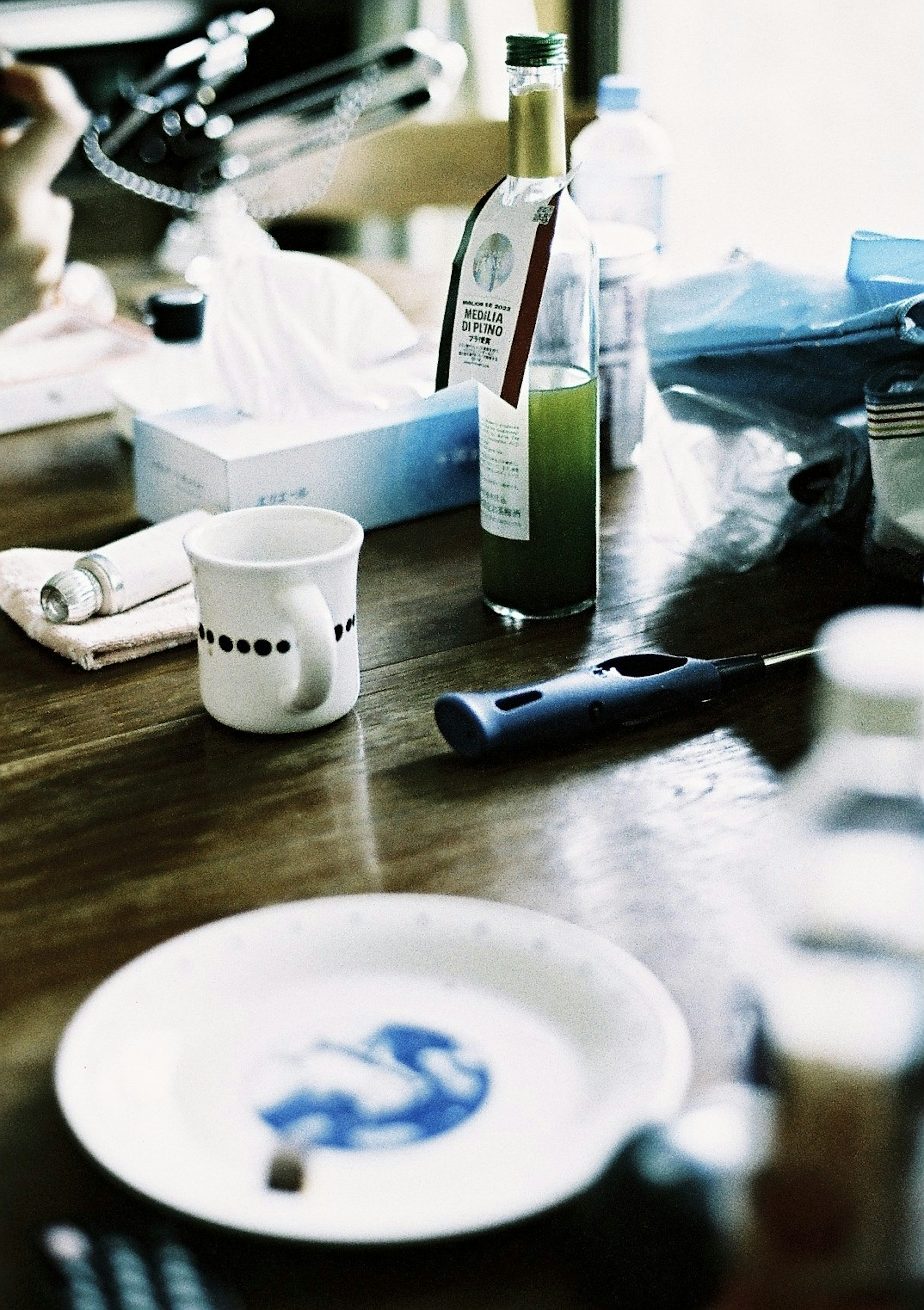 Close-up of dishes and cooking utensils on a table