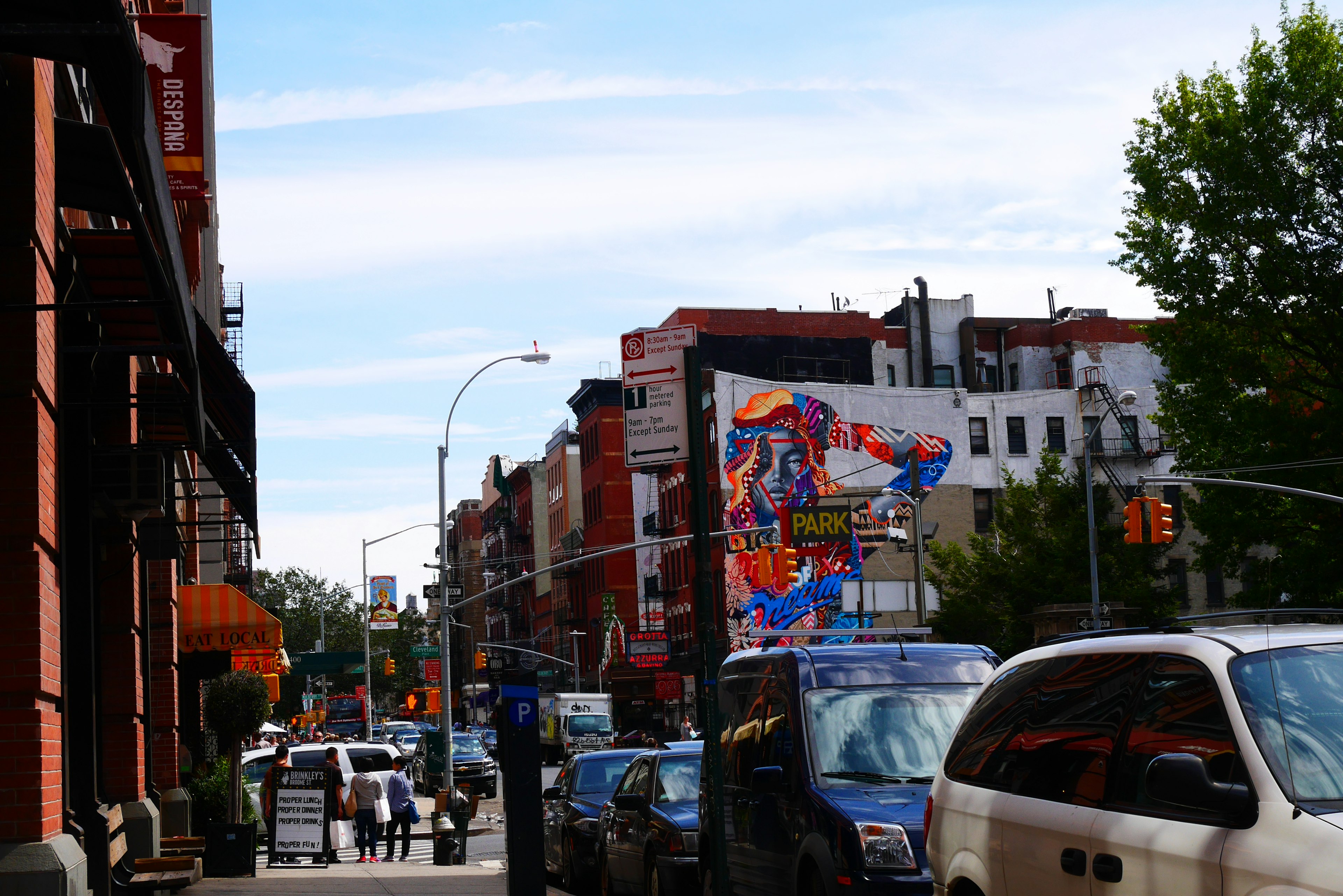 Street view featuring colorful art and buildings