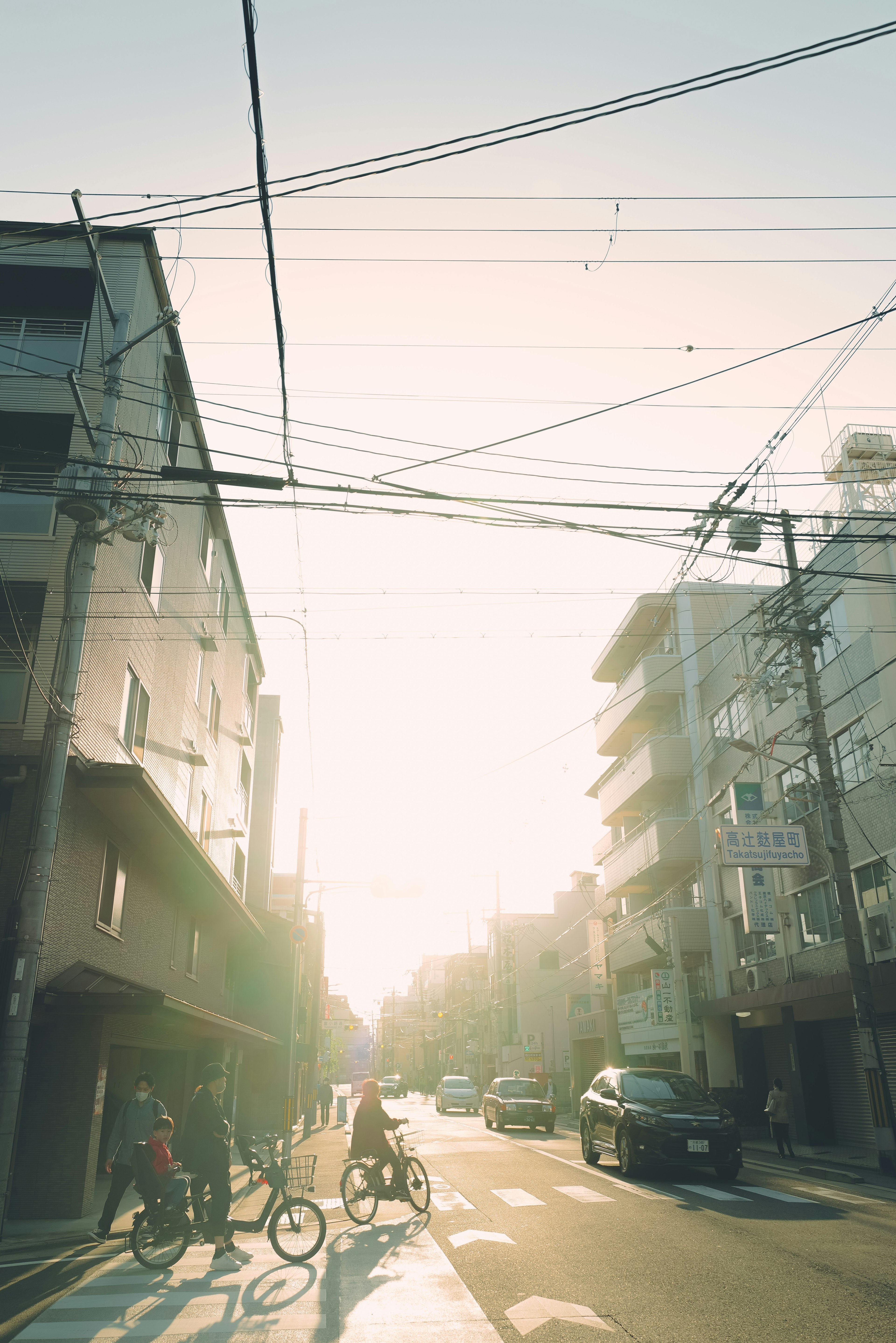 City street at sunset with bicycles