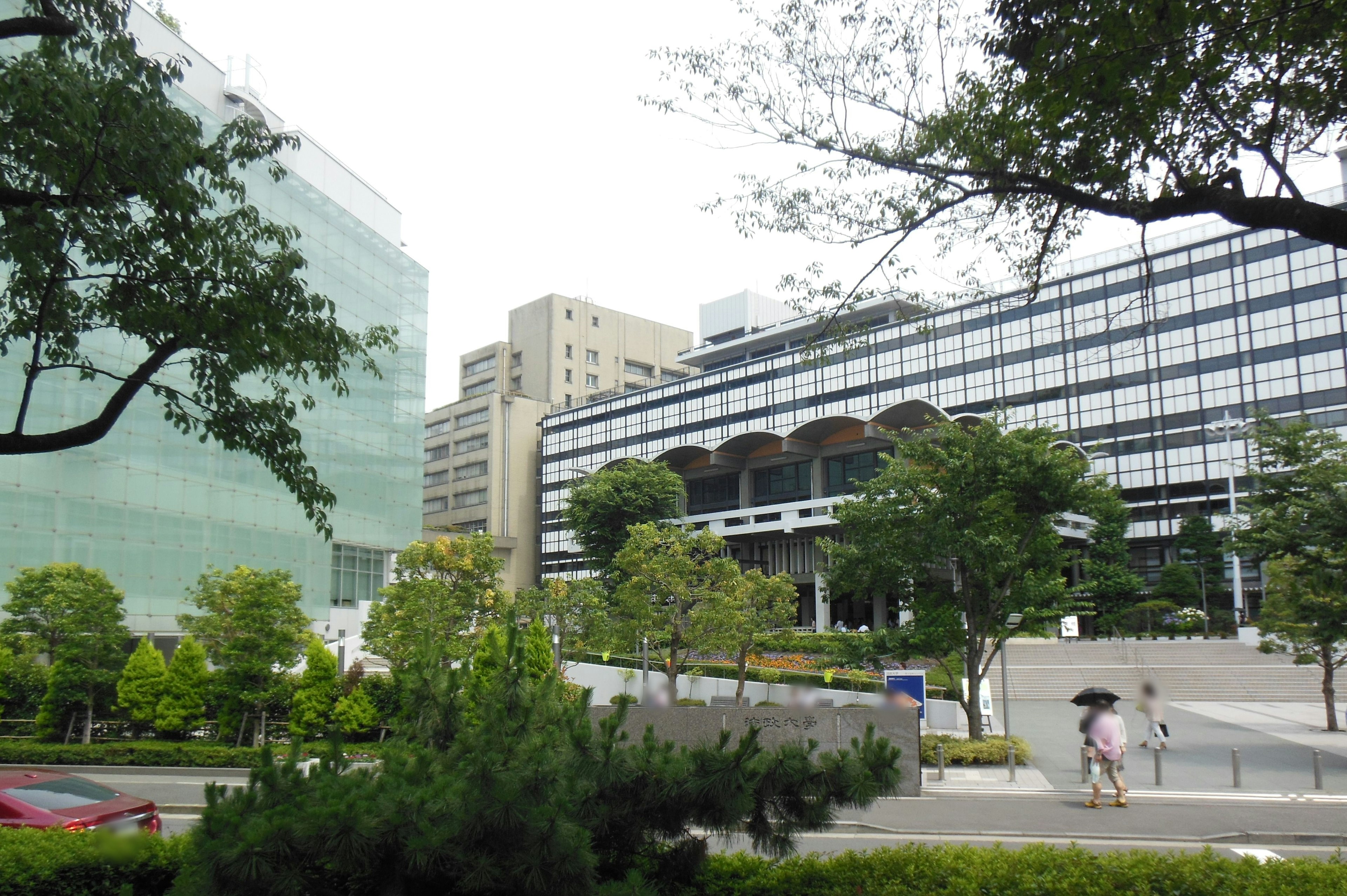 Lush park with modern buildings and pathways