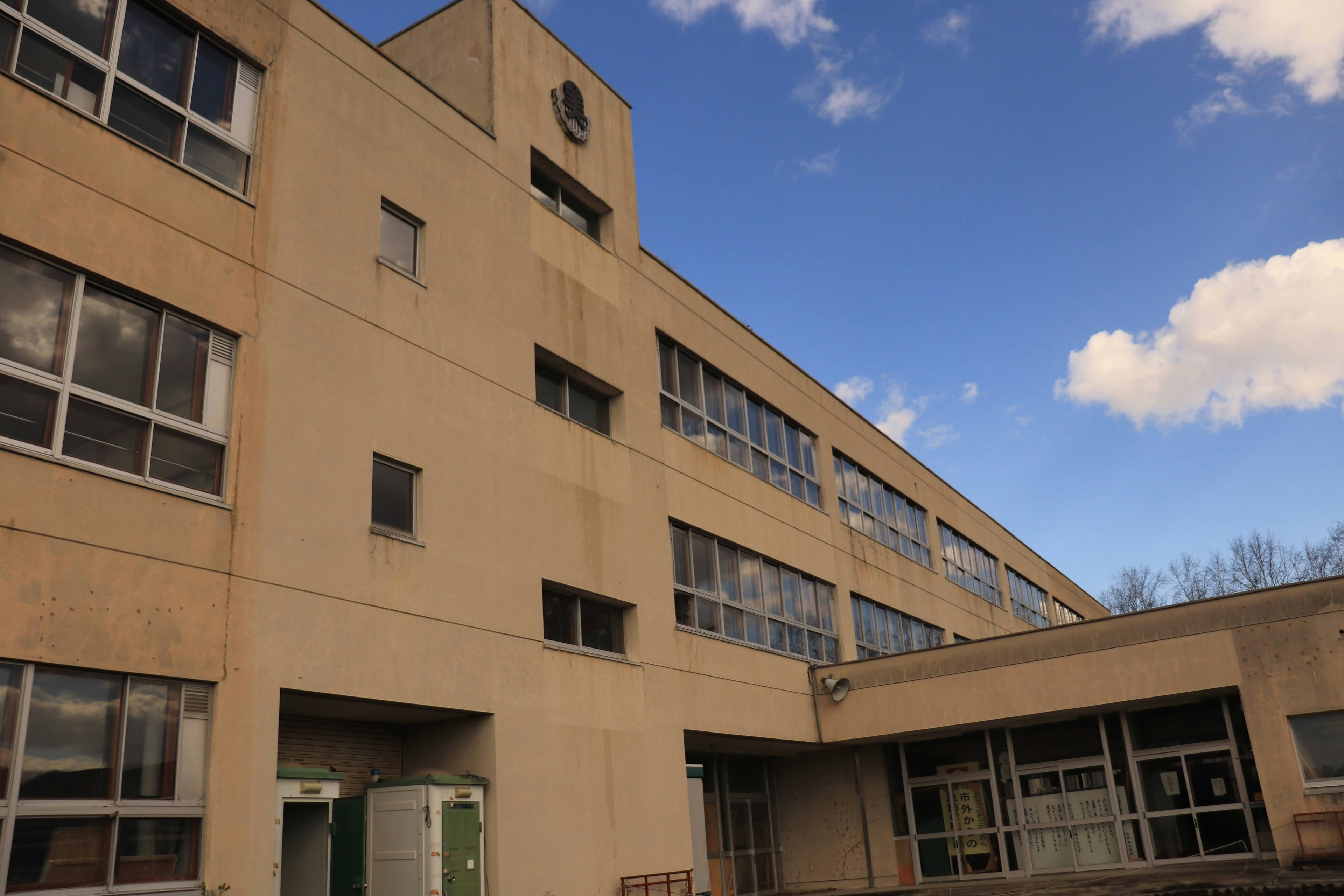 Modern building with gray exterior and large windows