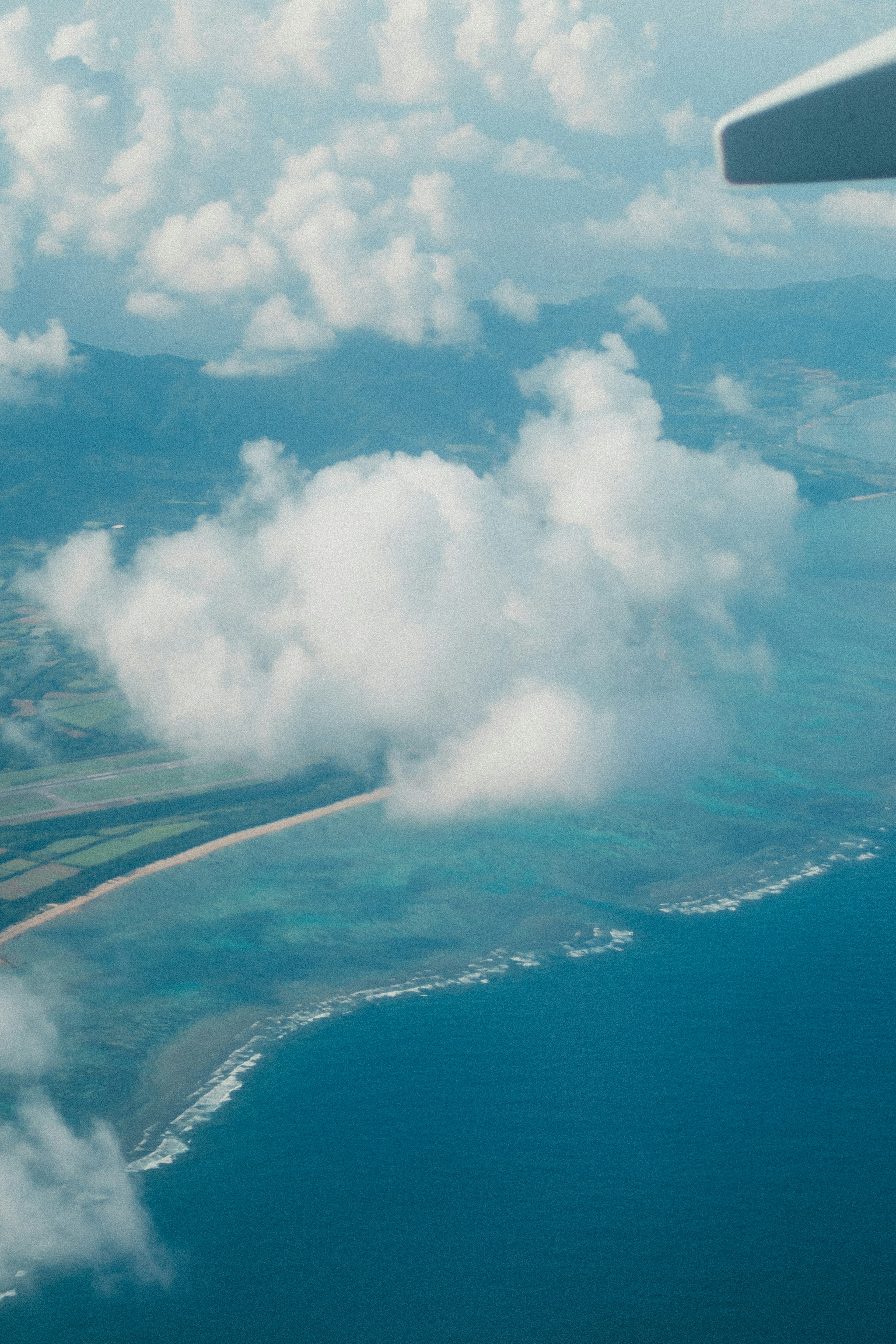 Aerial view of coastline and blue ocean