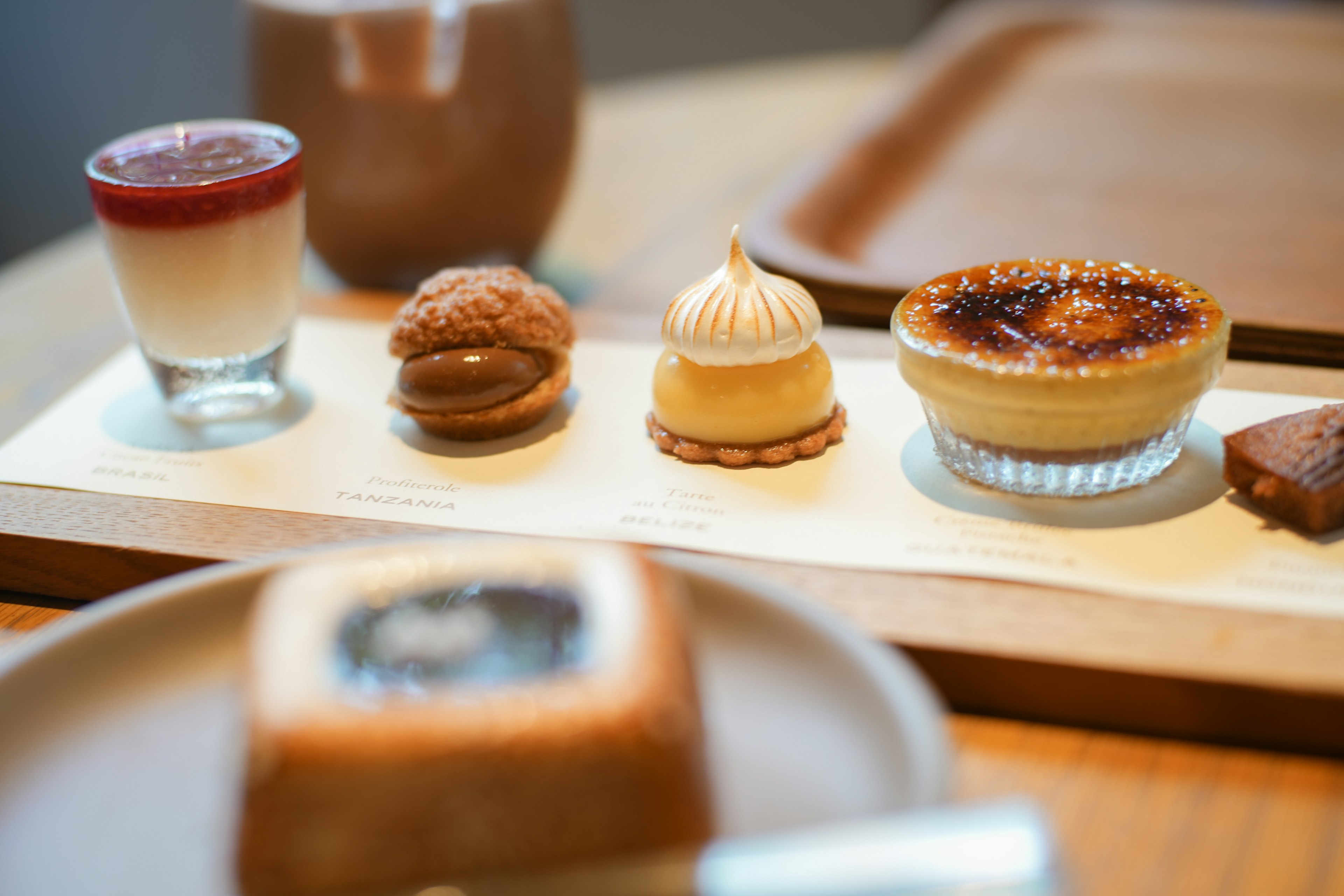 A beautiful assortment of desserts displayed on a wooden tray