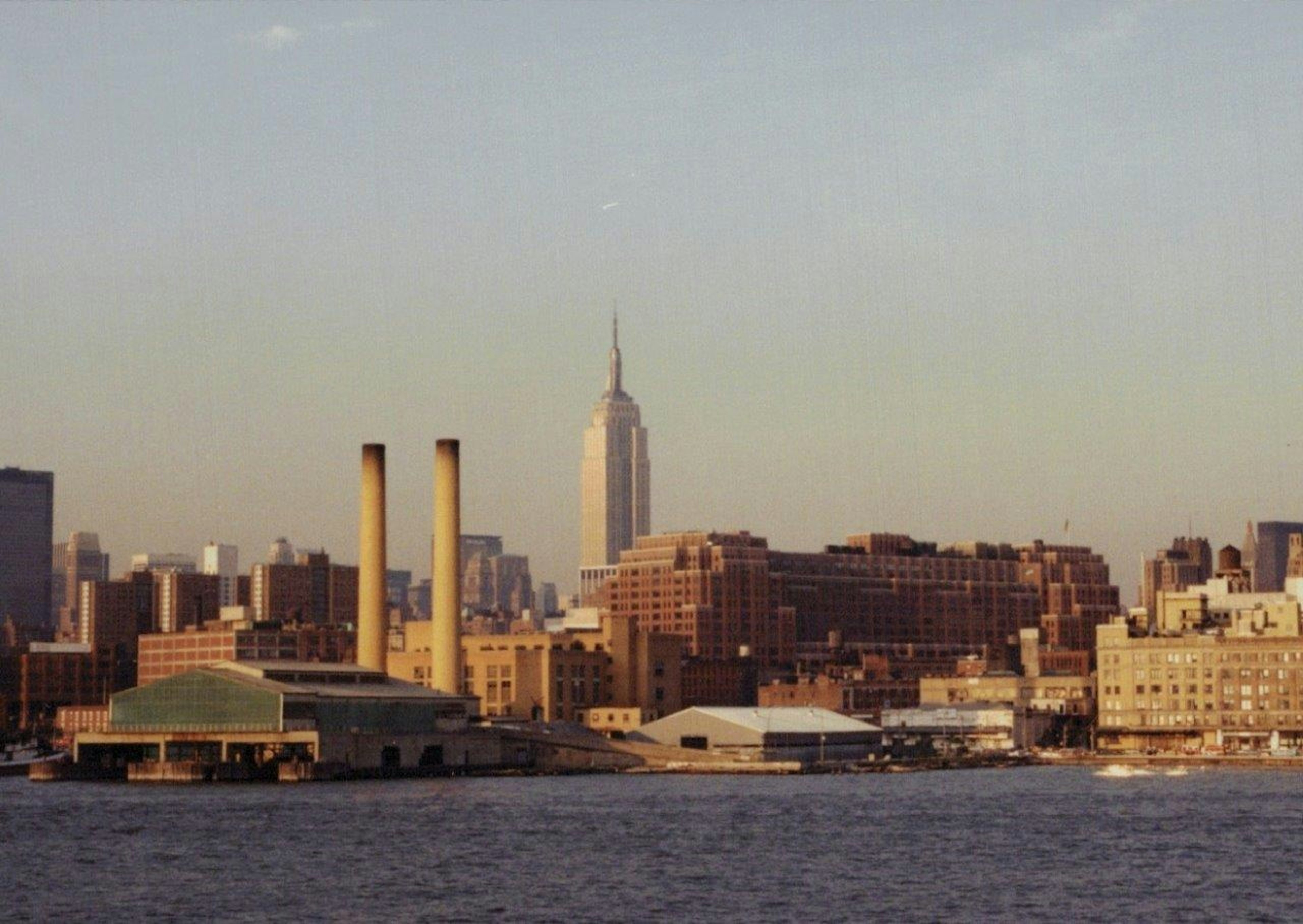 New York City skyline at sunset featuring the Empire State Building