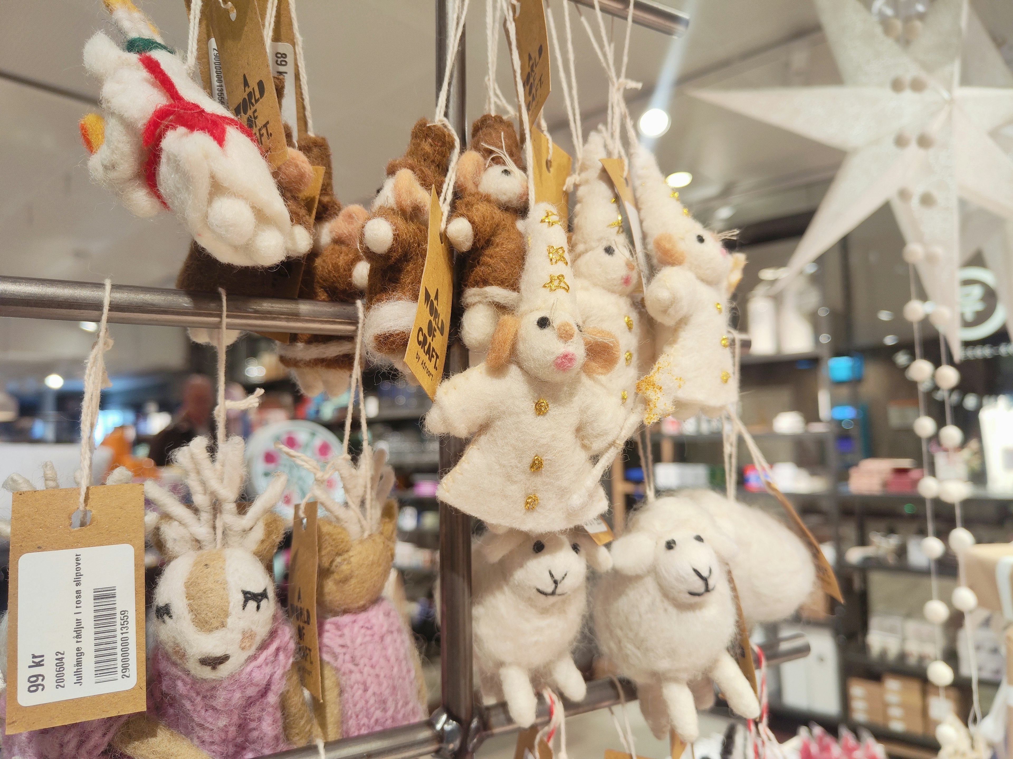 Cute animal plush toys hanging on a display