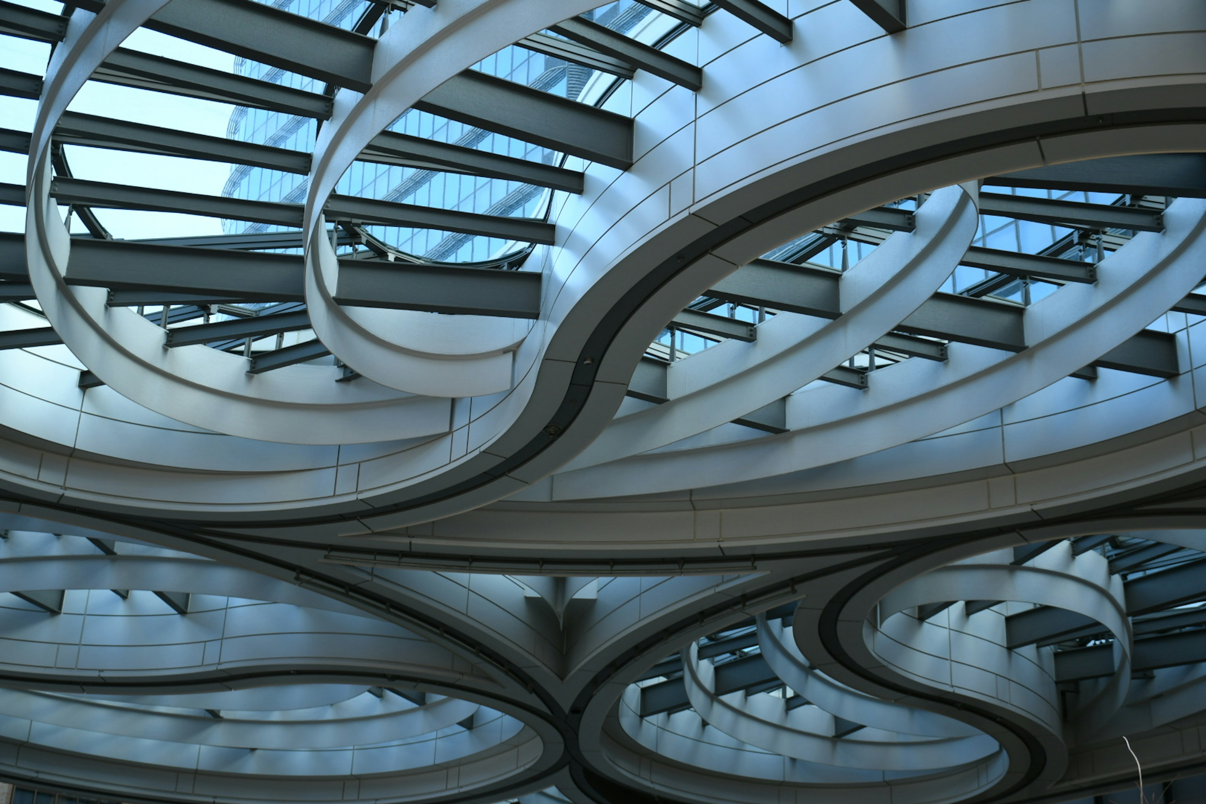 Modern architectural ceiling design with complex curves