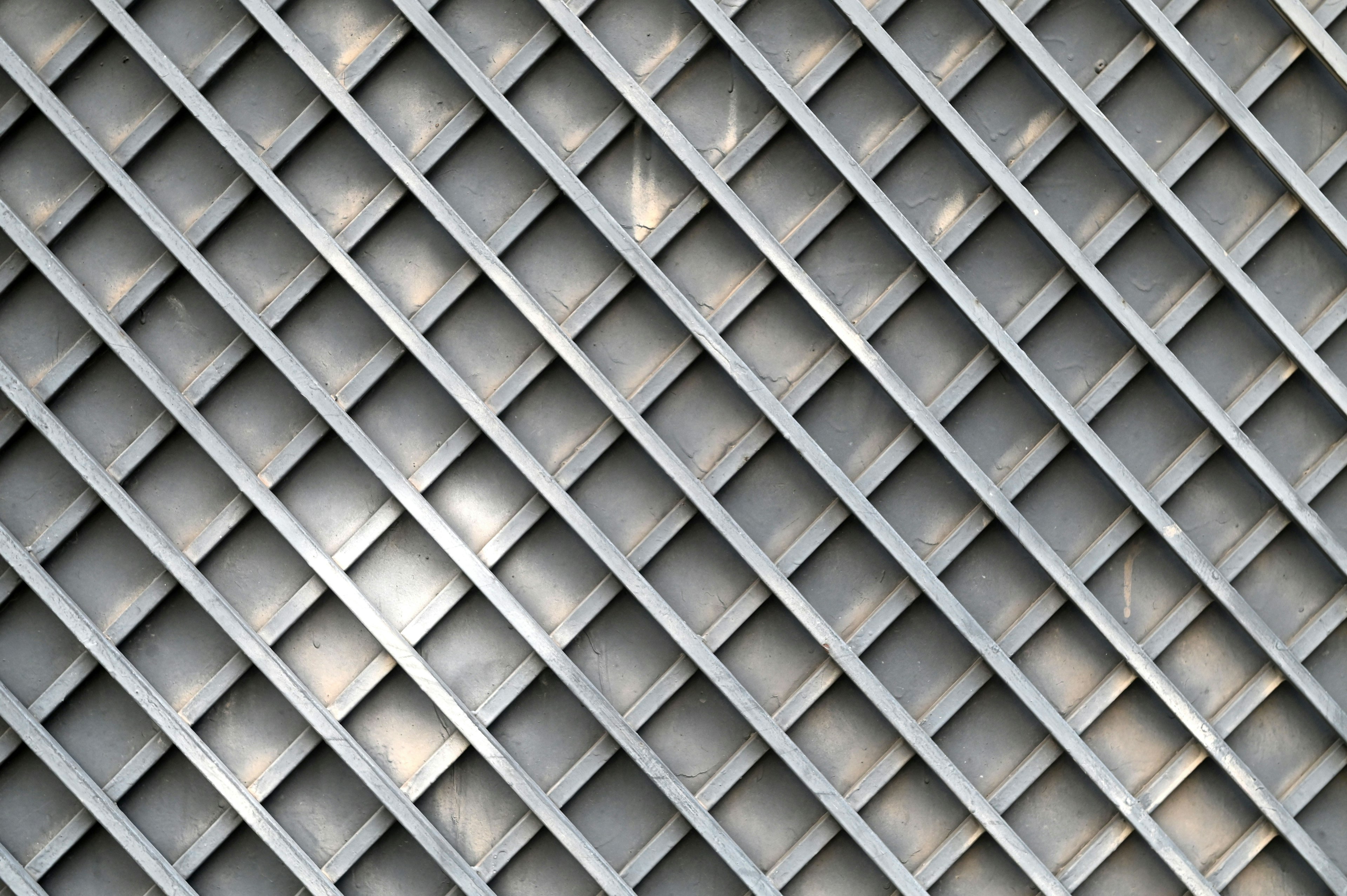 Diagonal gray lattice pattern with a textured surface