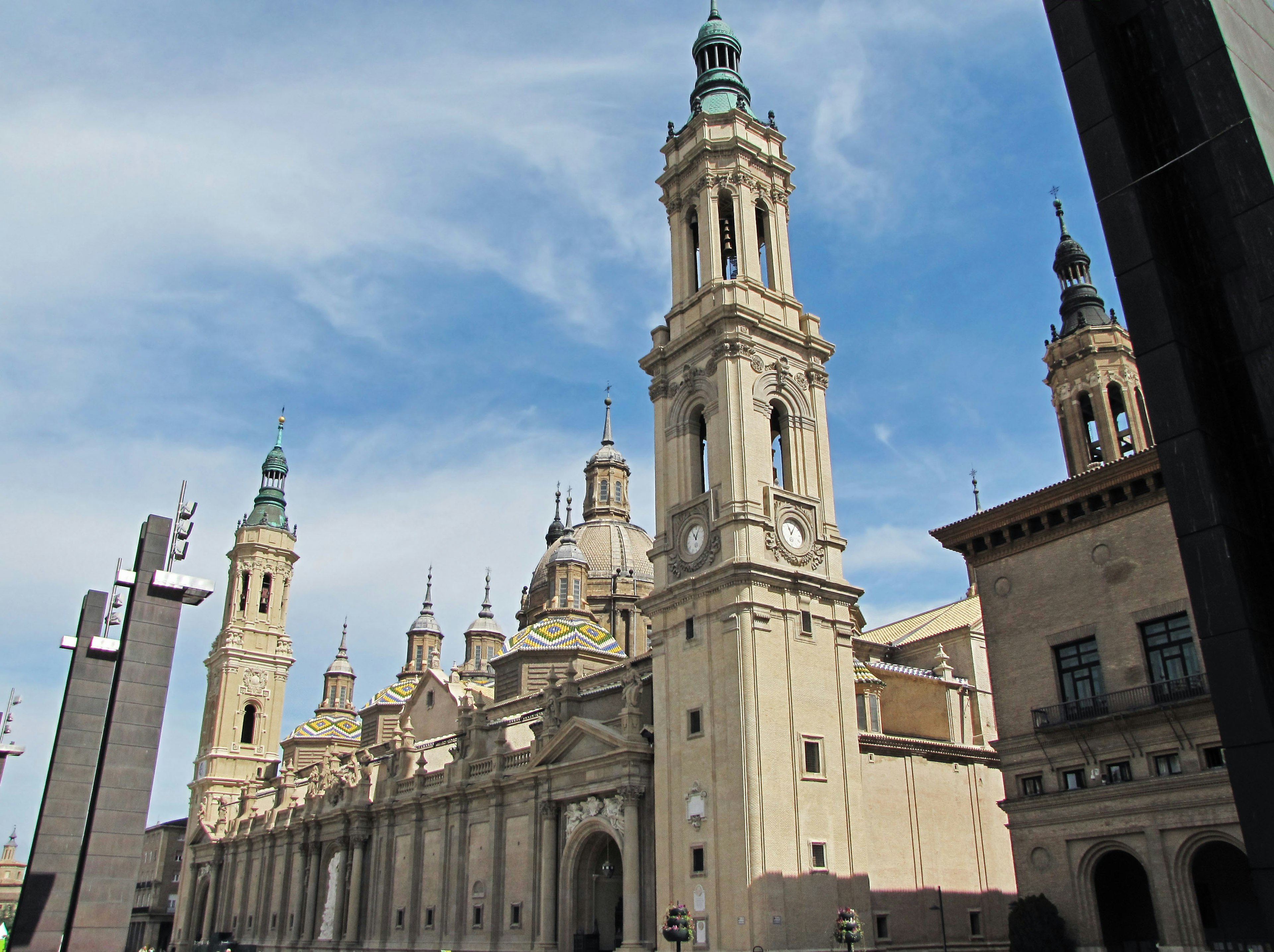 Beautiful building exterior with towers under a blue sky