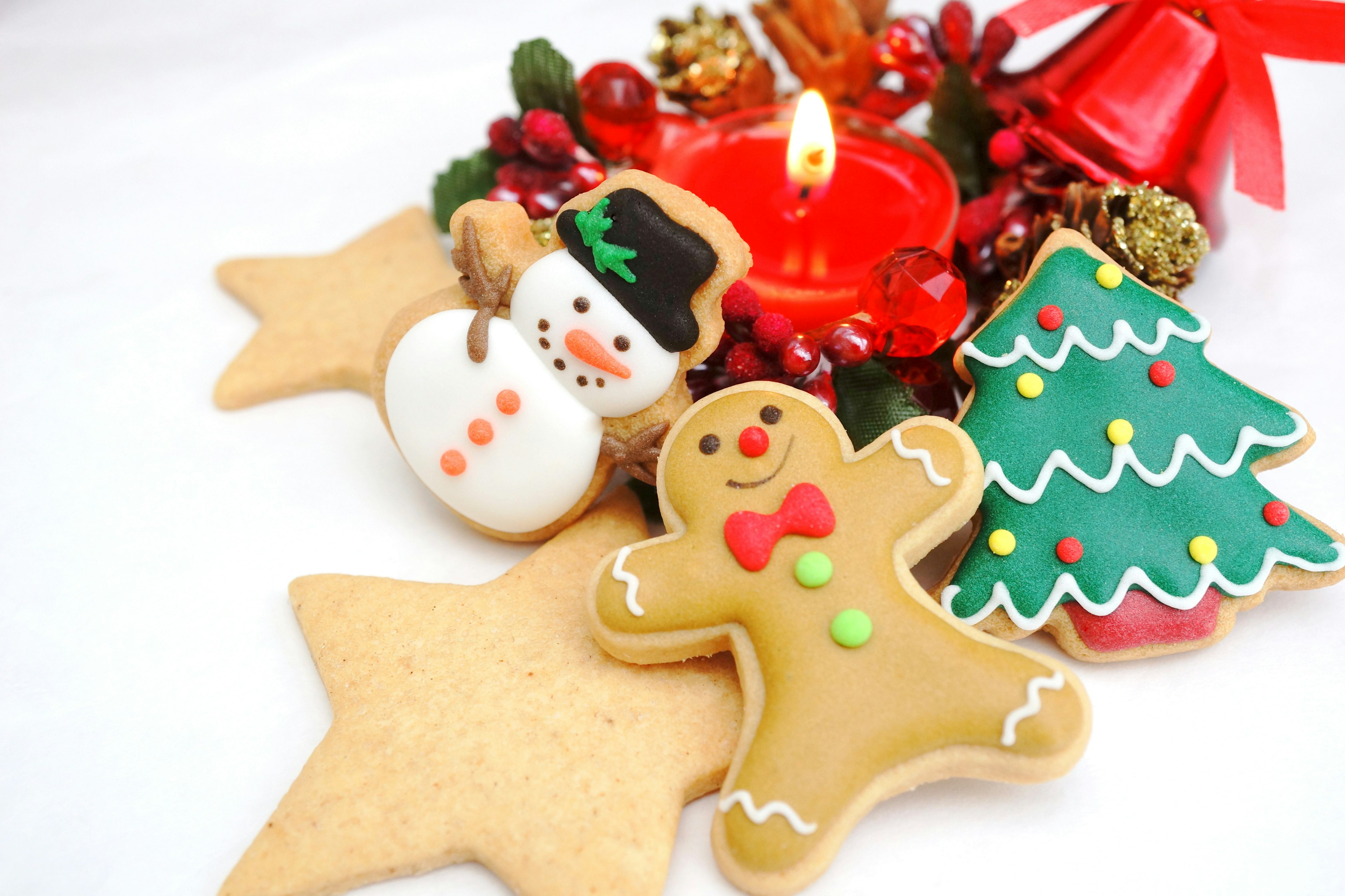 Christmas cookies and a decorative candle arrangement