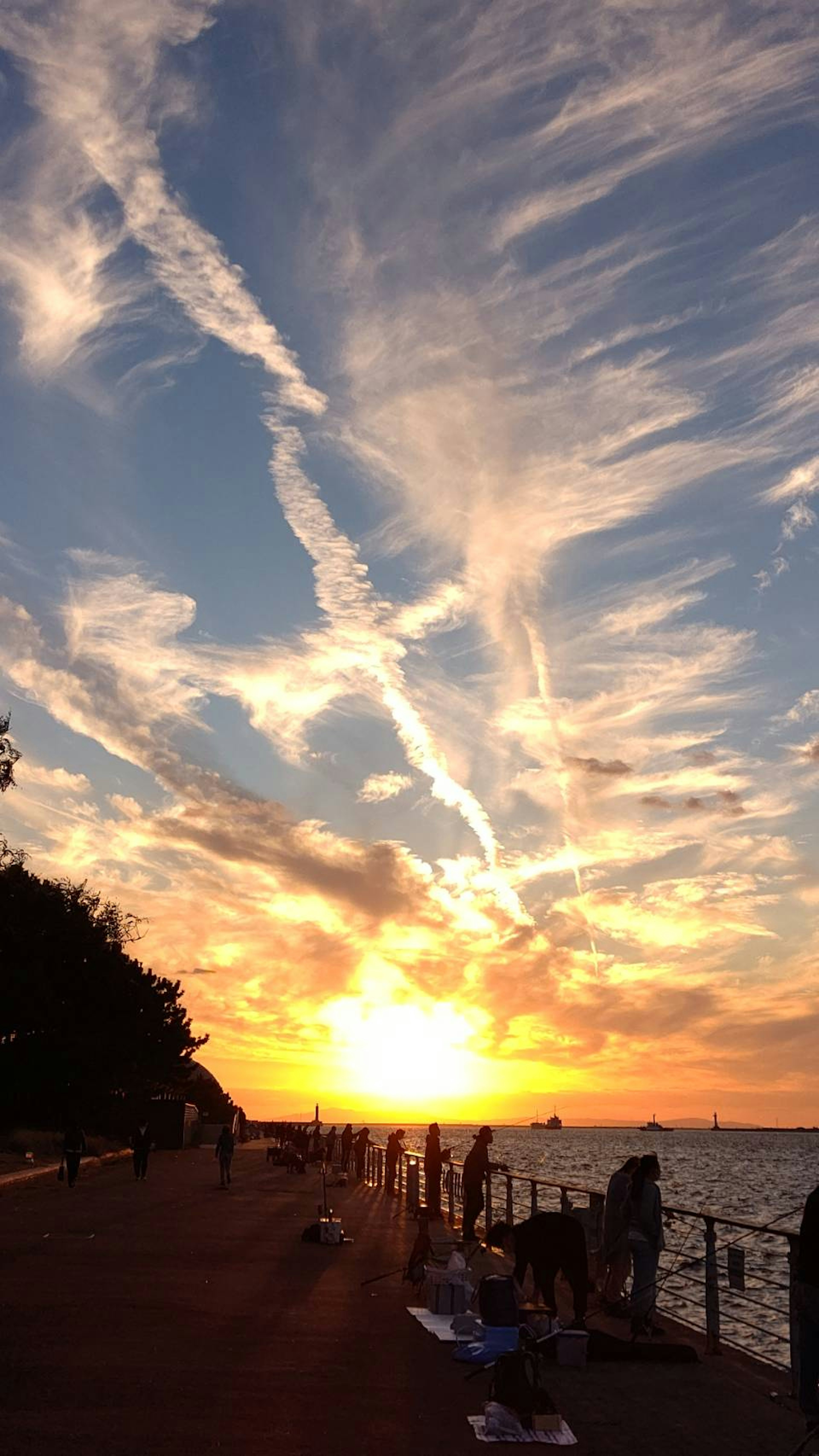 Beautiful sunset with cloud patterns over the coastline