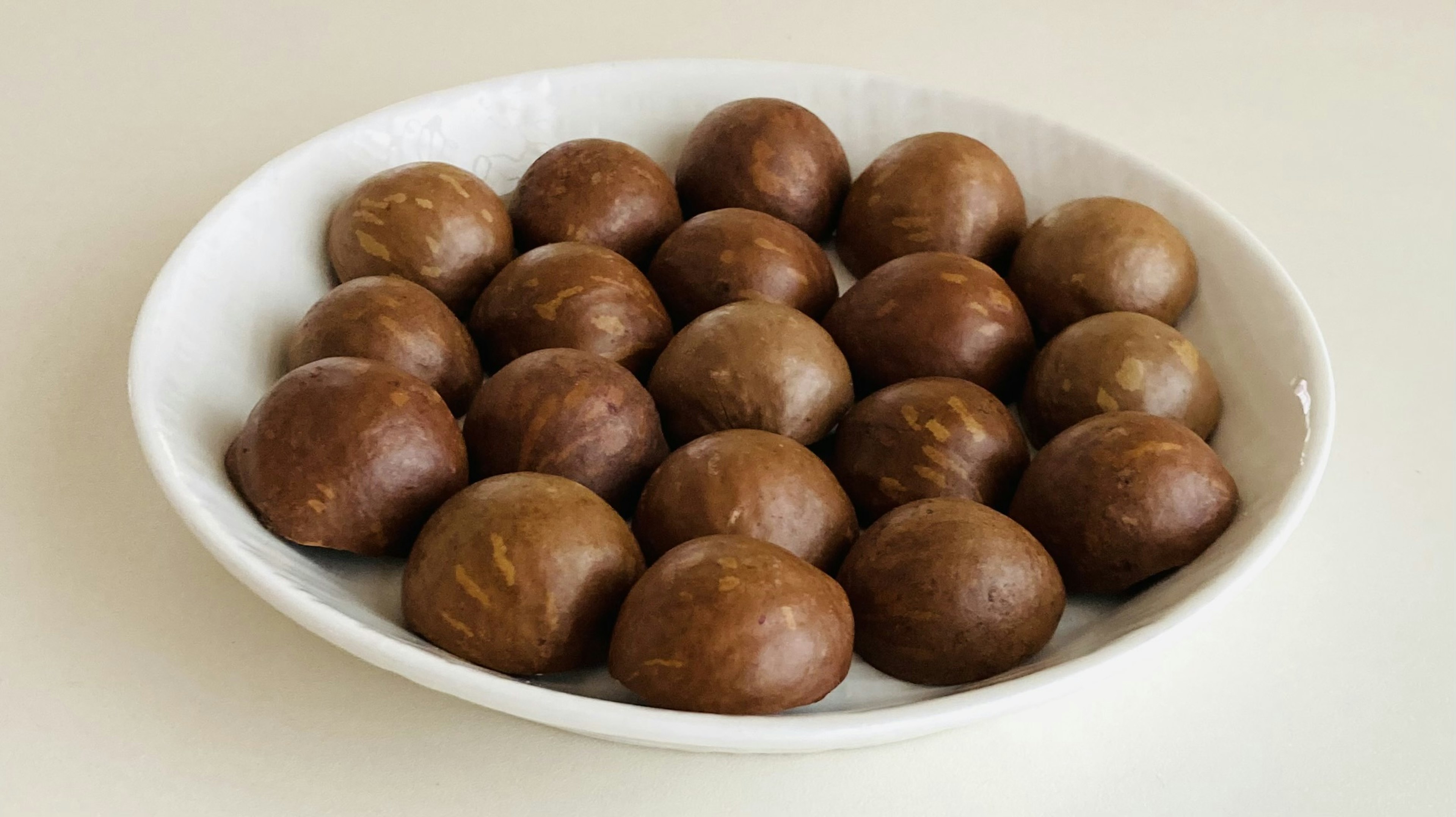 A plate filled with round brown objects