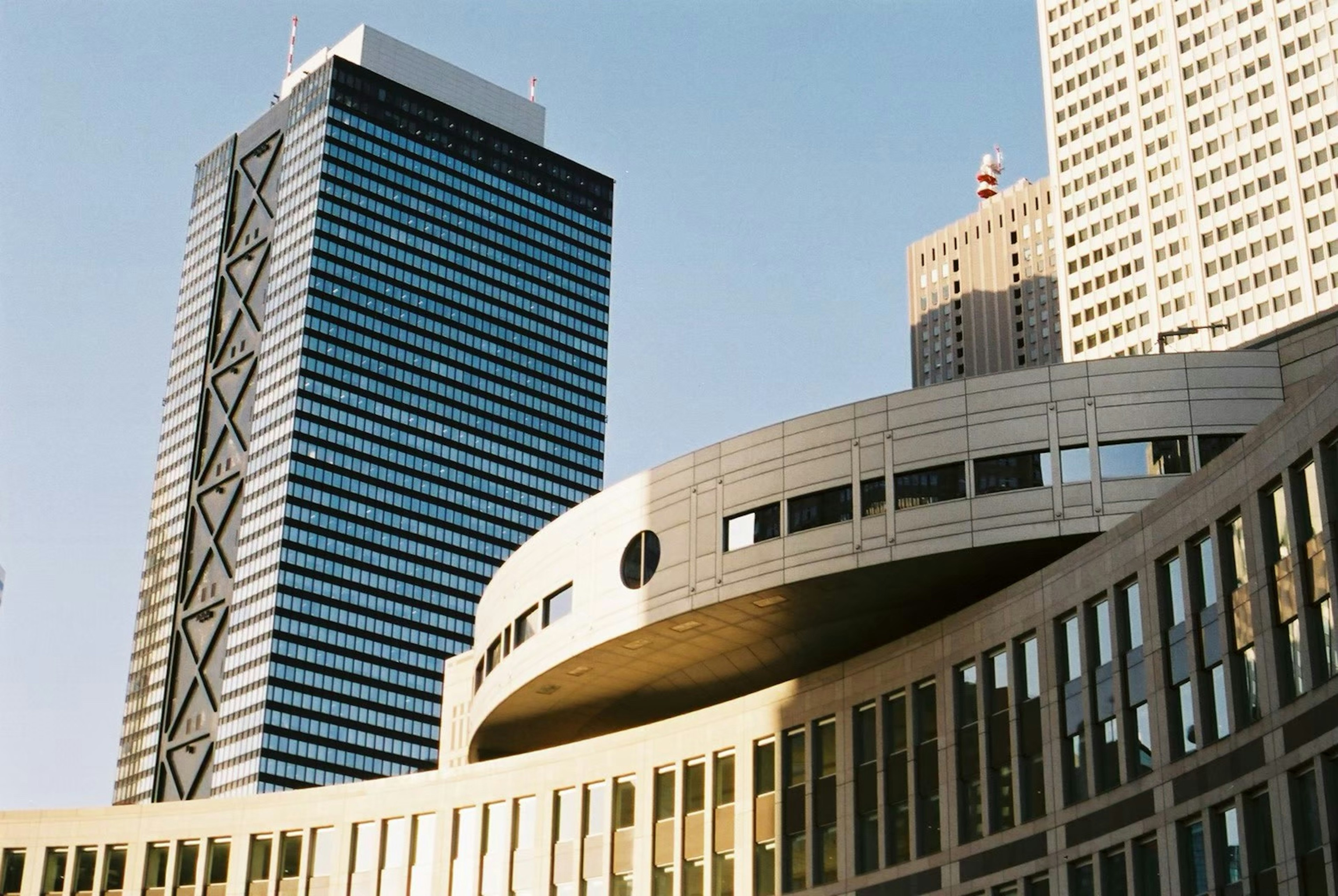 Urban landscape featuring modern buildings and a circular structure