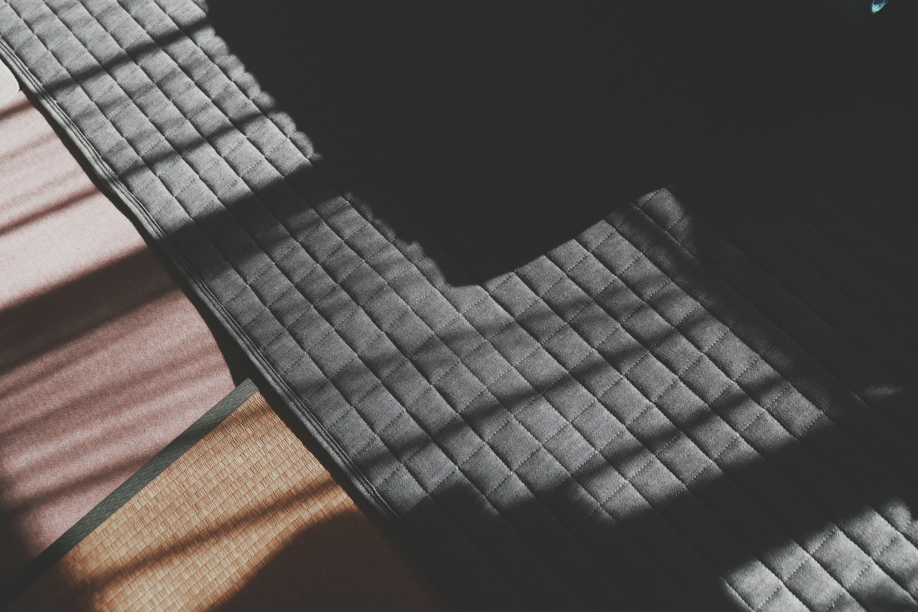 Texture on the floor with intersecting light and shadow