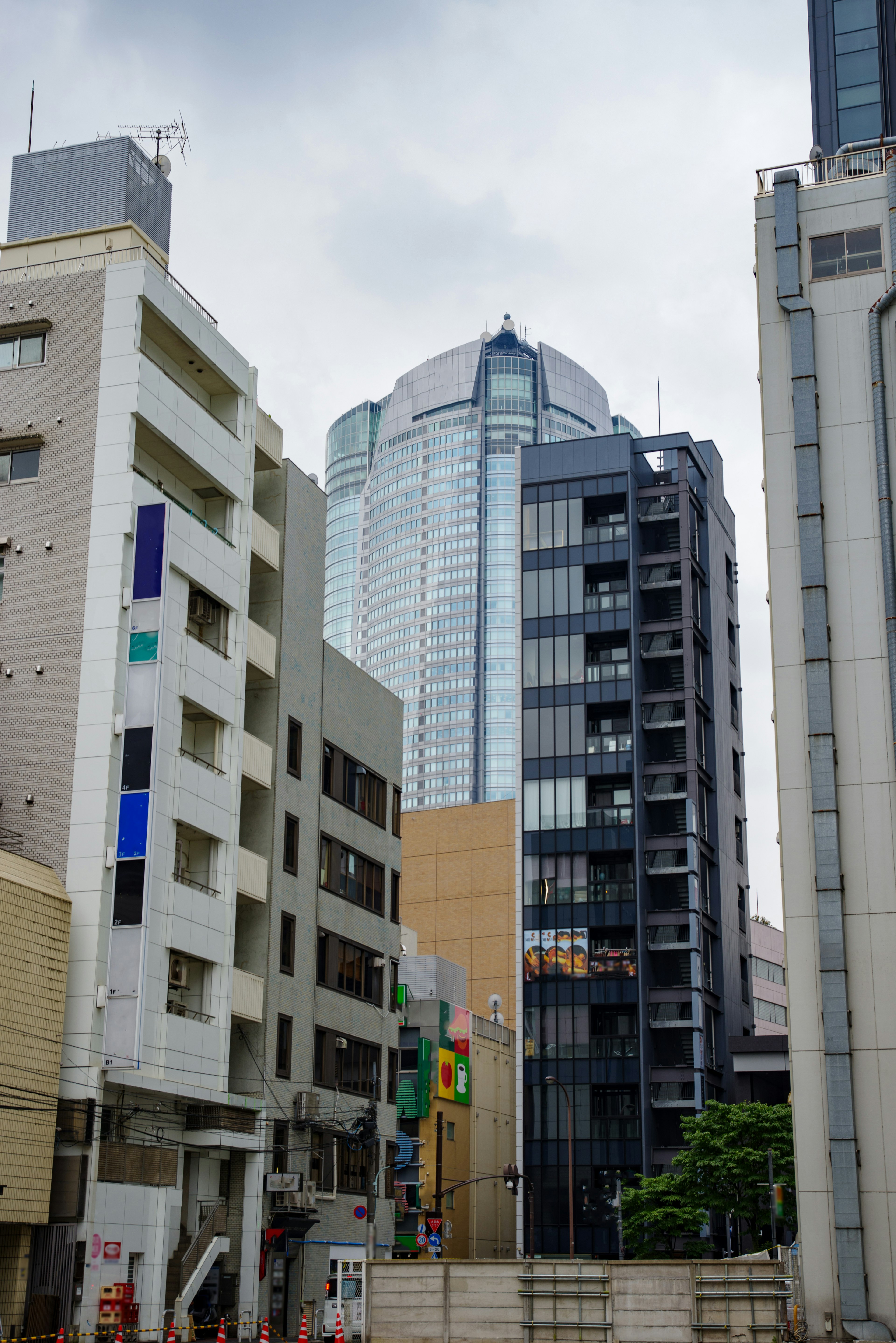 Urban landscape featuring modern skyscrapers and older buildings coexisting