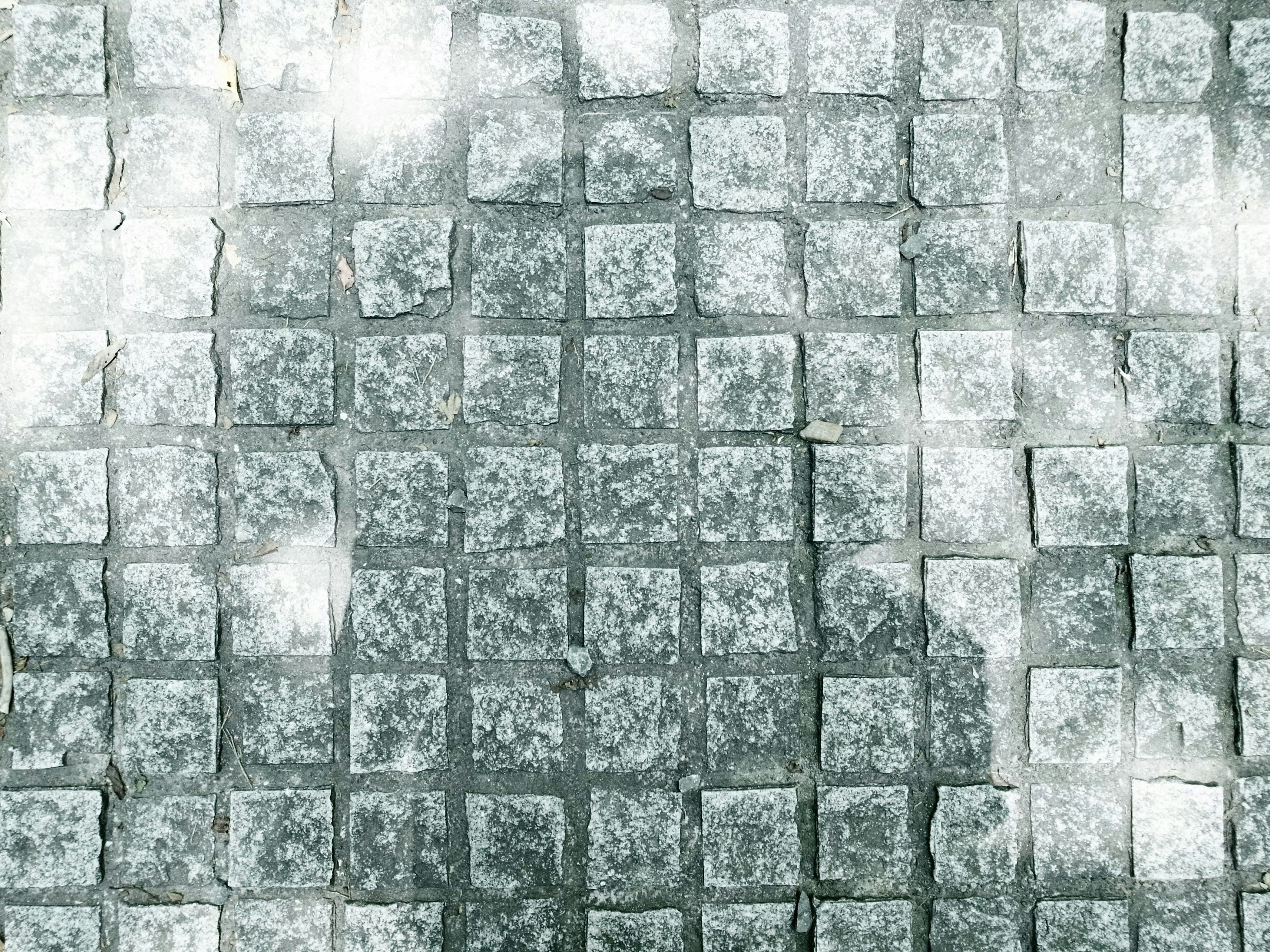 Background showing a patterned cobblestone surface