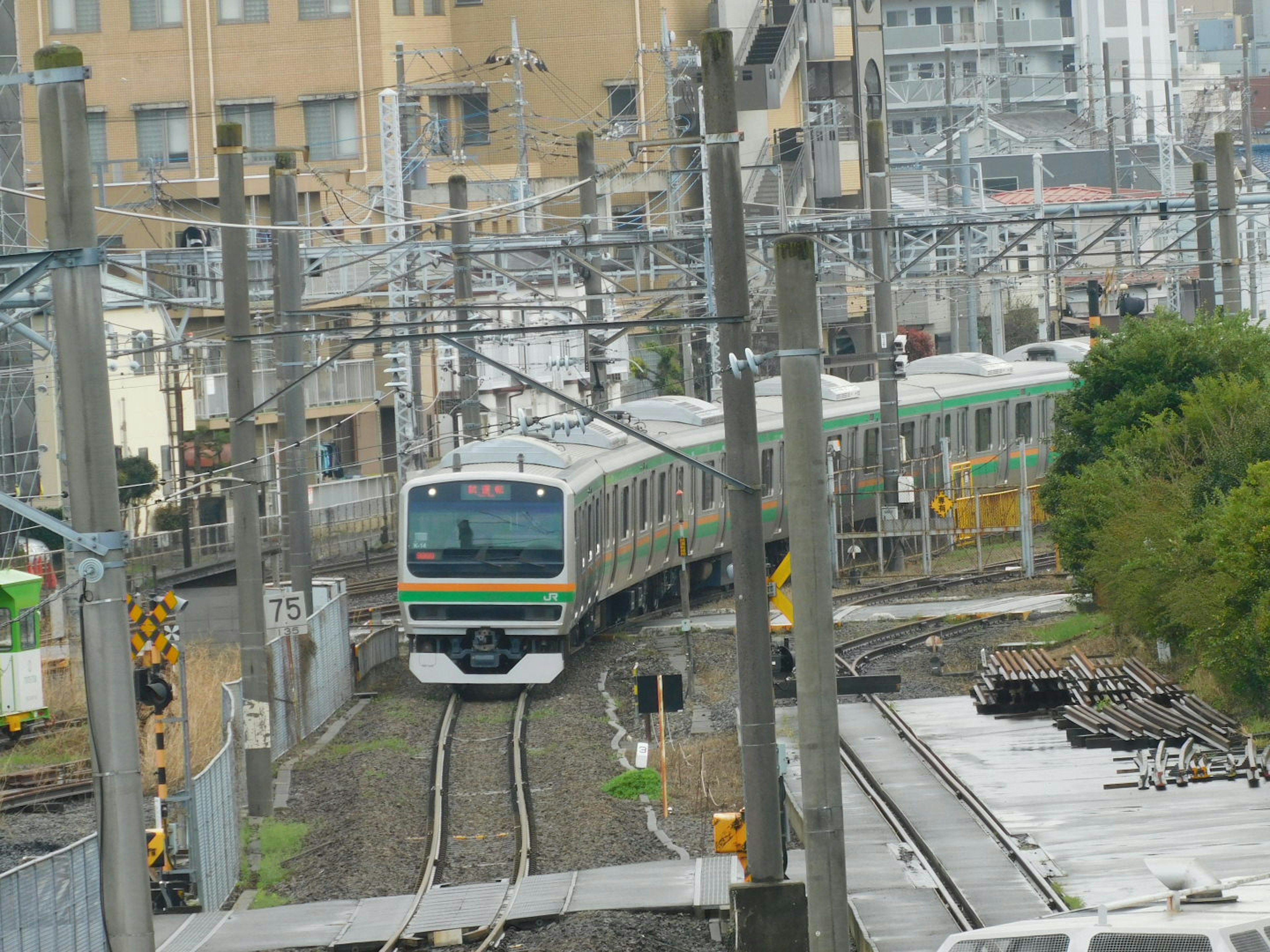 Train navigating through urban railway tracks