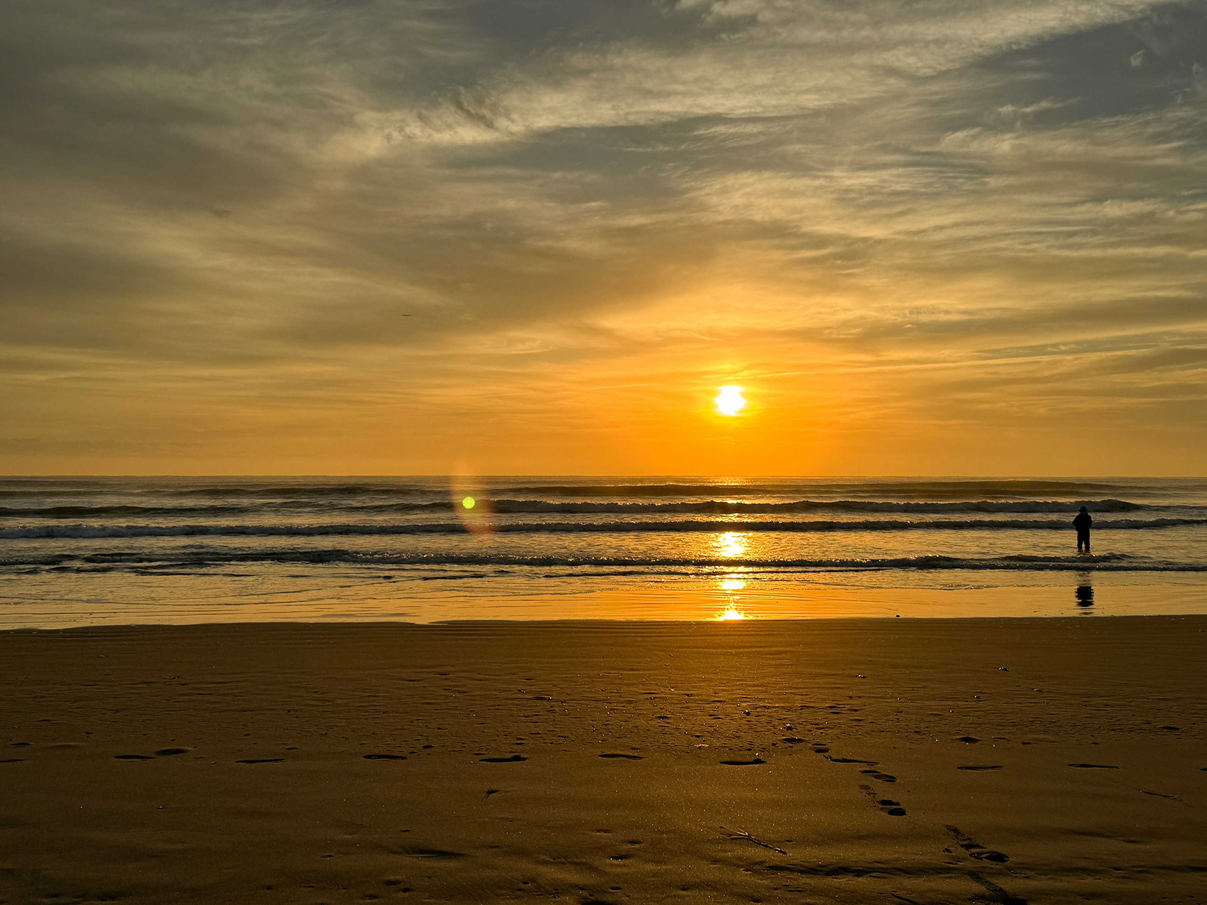 Beautiful sunset over the ocean with gentle waves