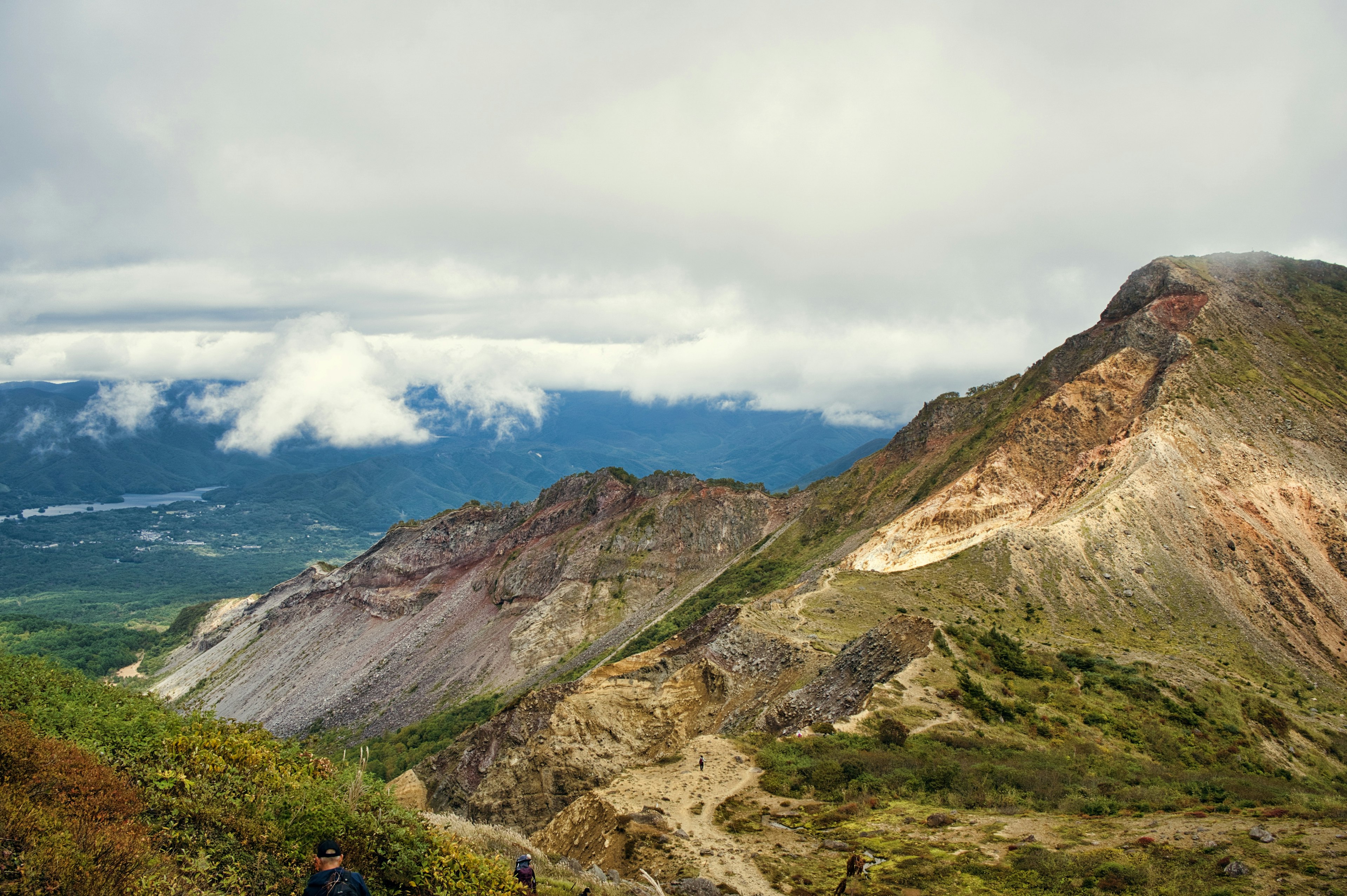 Mountain landscape with clouds and rugged terrain