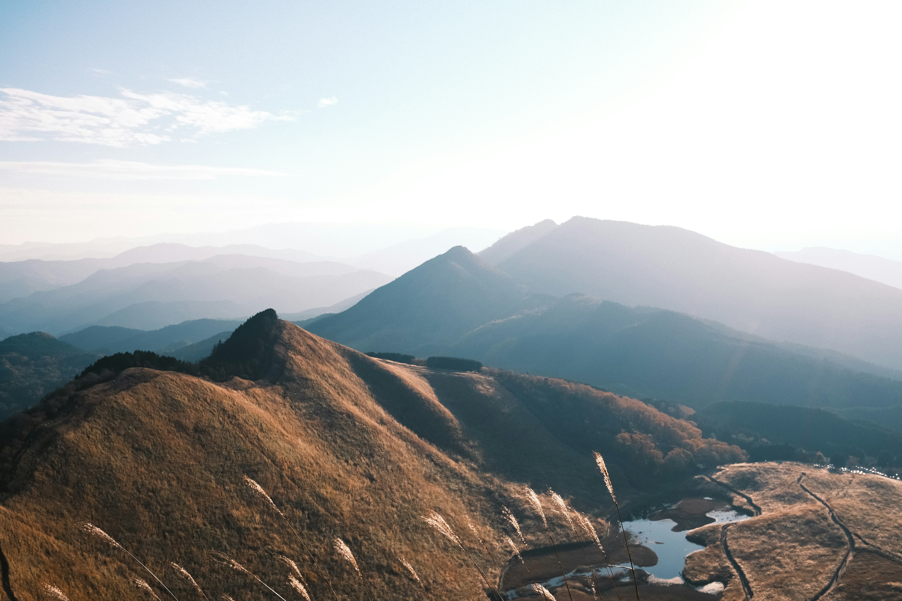 Stunning landscape with mountains and valleys under bright sky